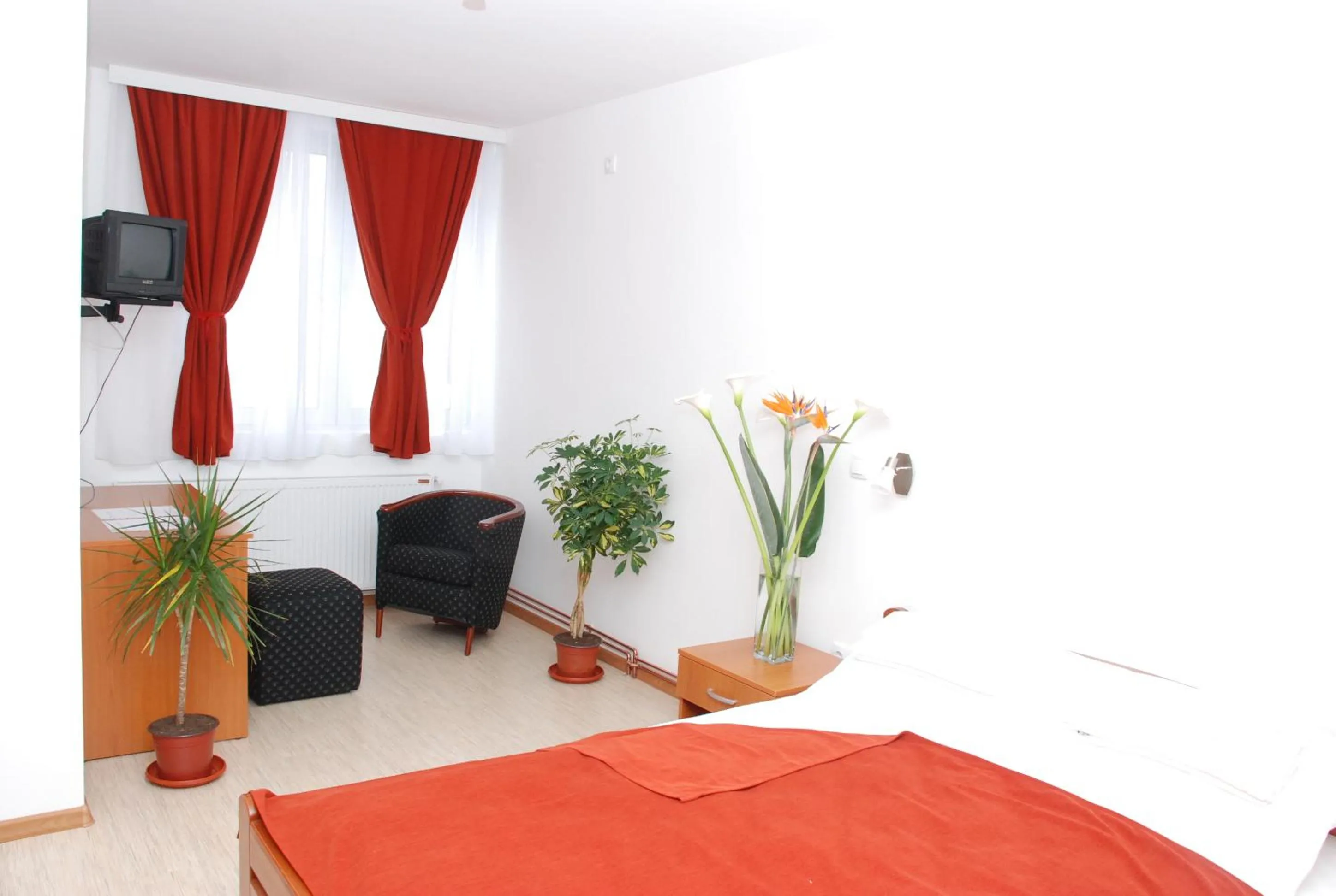 Bed in M Garni Hotel