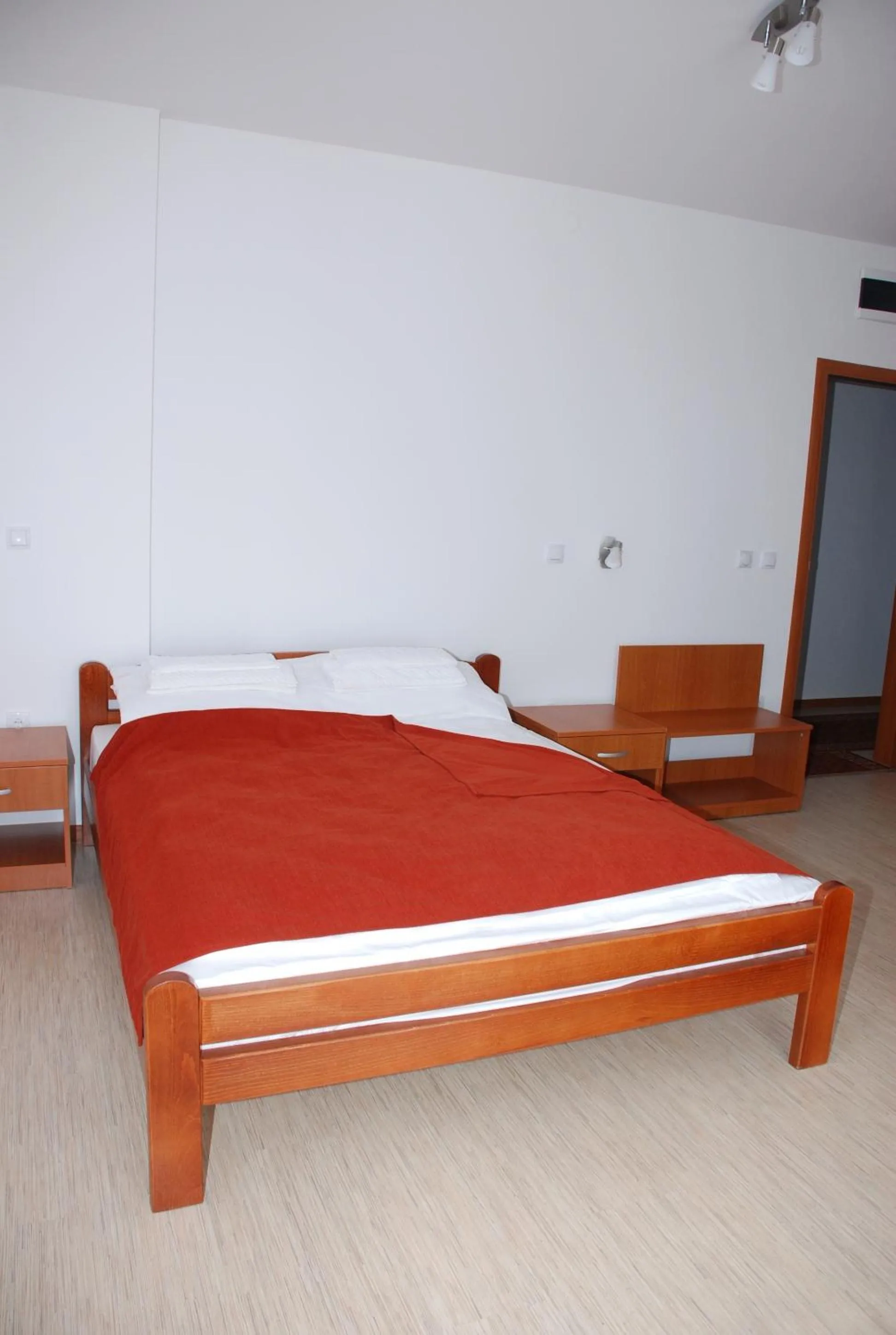 Bed in M Garni Hotel