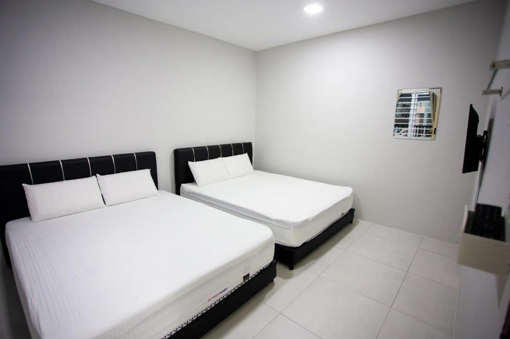 Bed in Hom2rex Kuching Homestay Taman Timberland