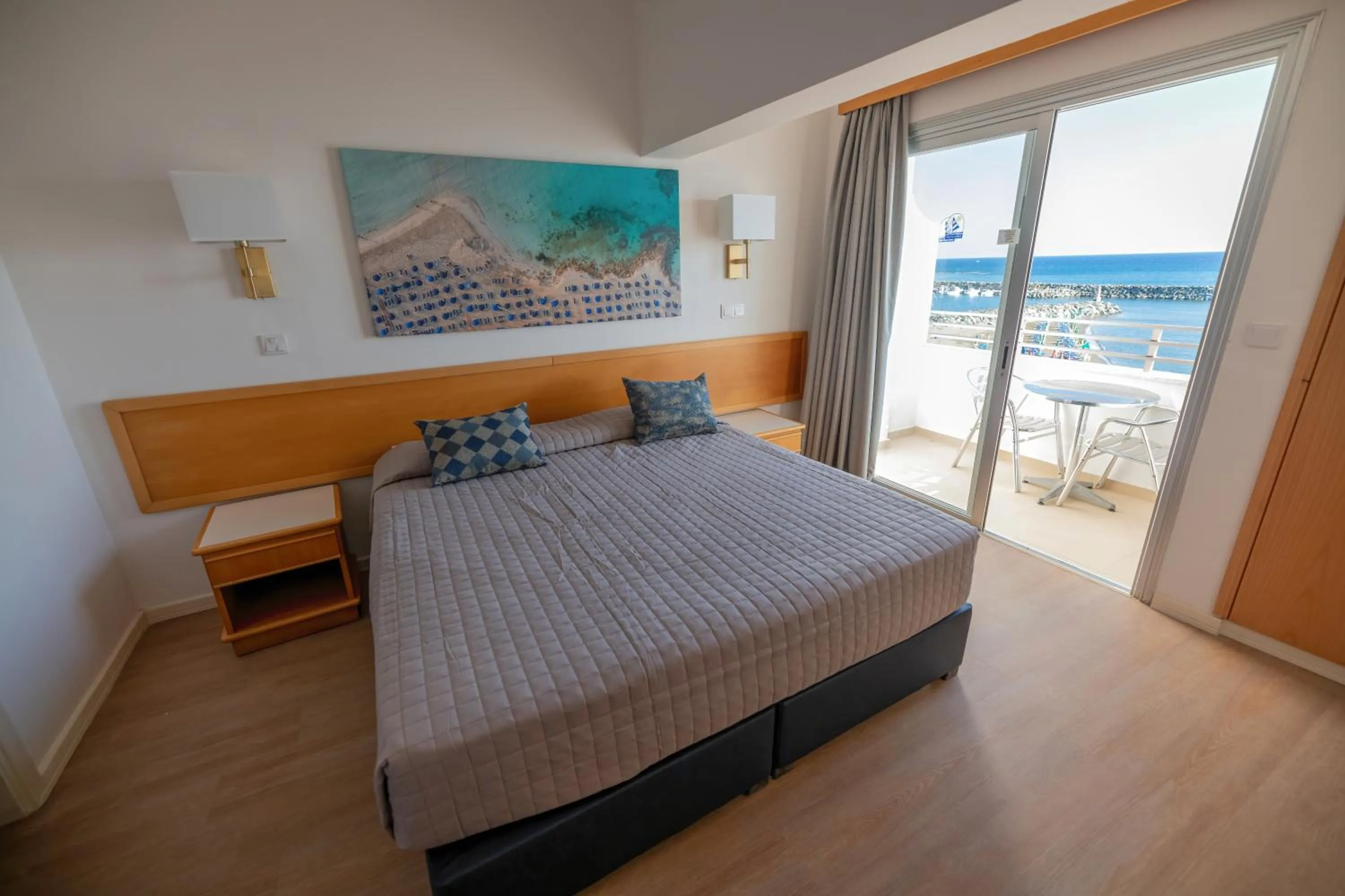 Bed in Tylos Beach Hotel