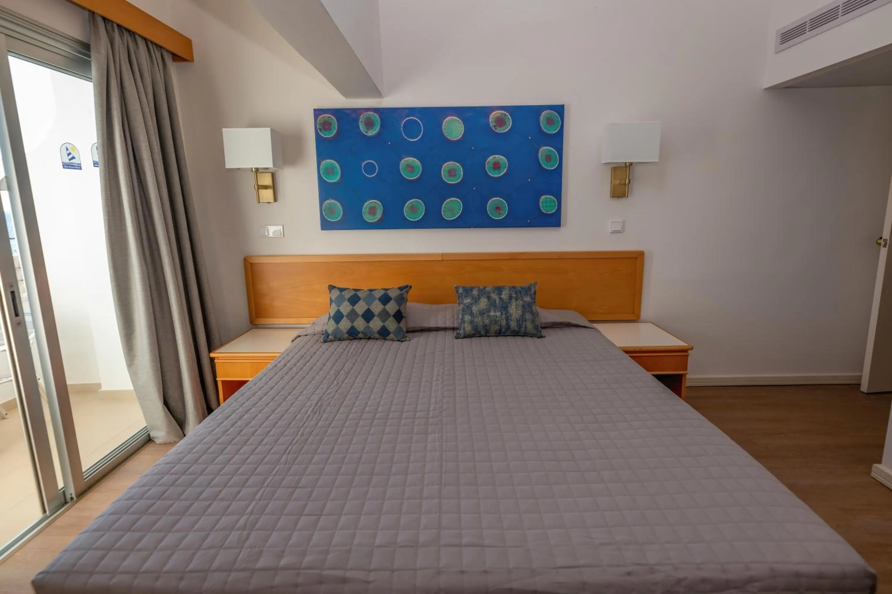 Bed in Tylos Beach Hotel