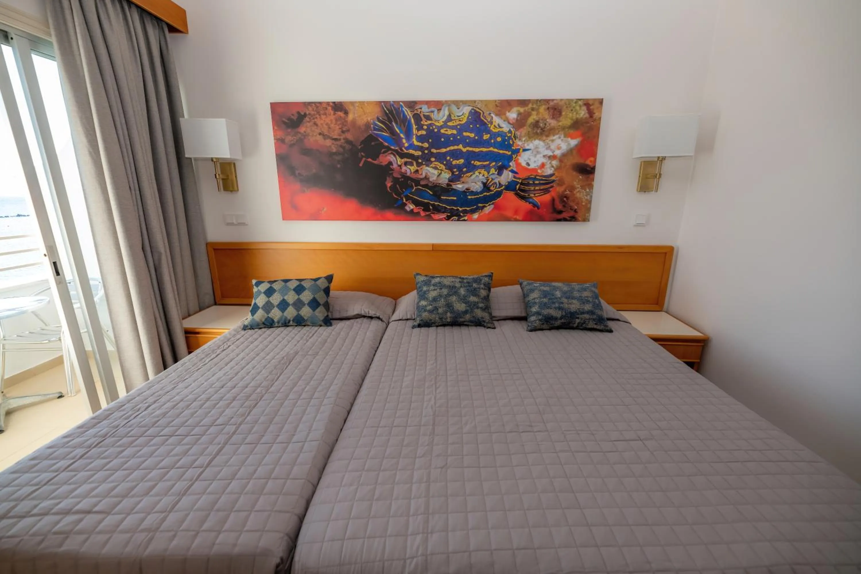 Bed in Tylos Beach Hotel