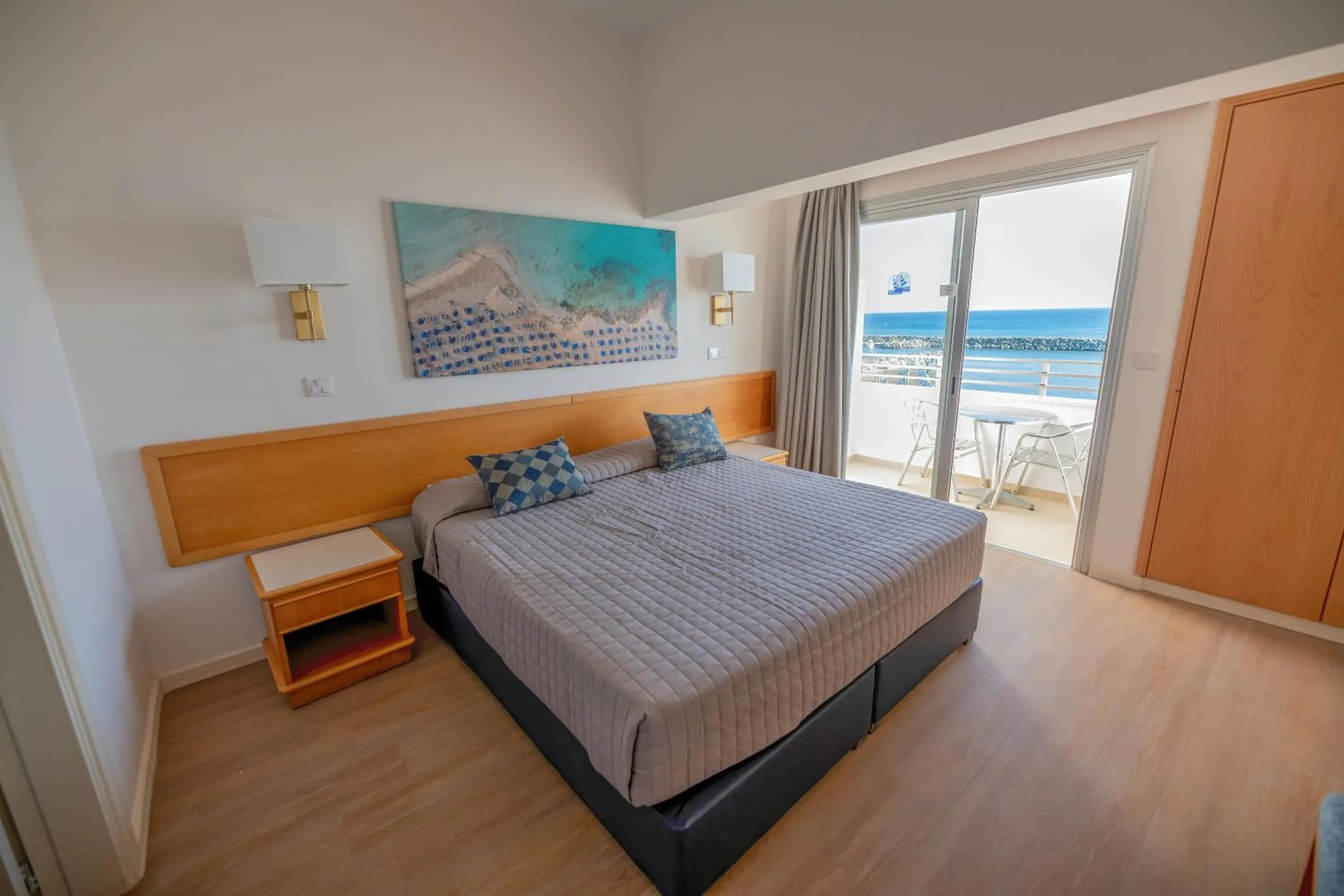 Bed in Tylos Beach Hotel