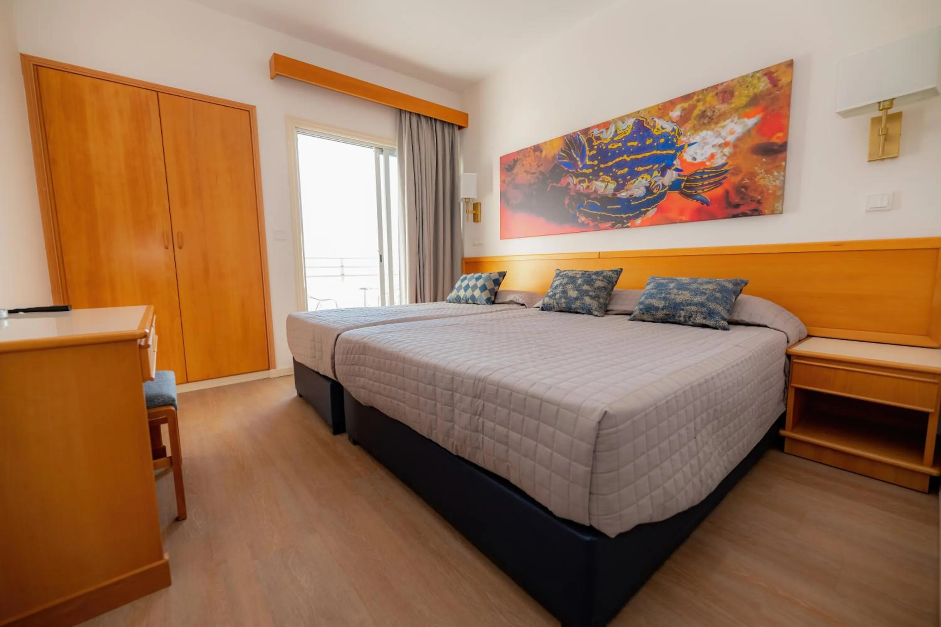 Bed in Tylos Beach Hotel