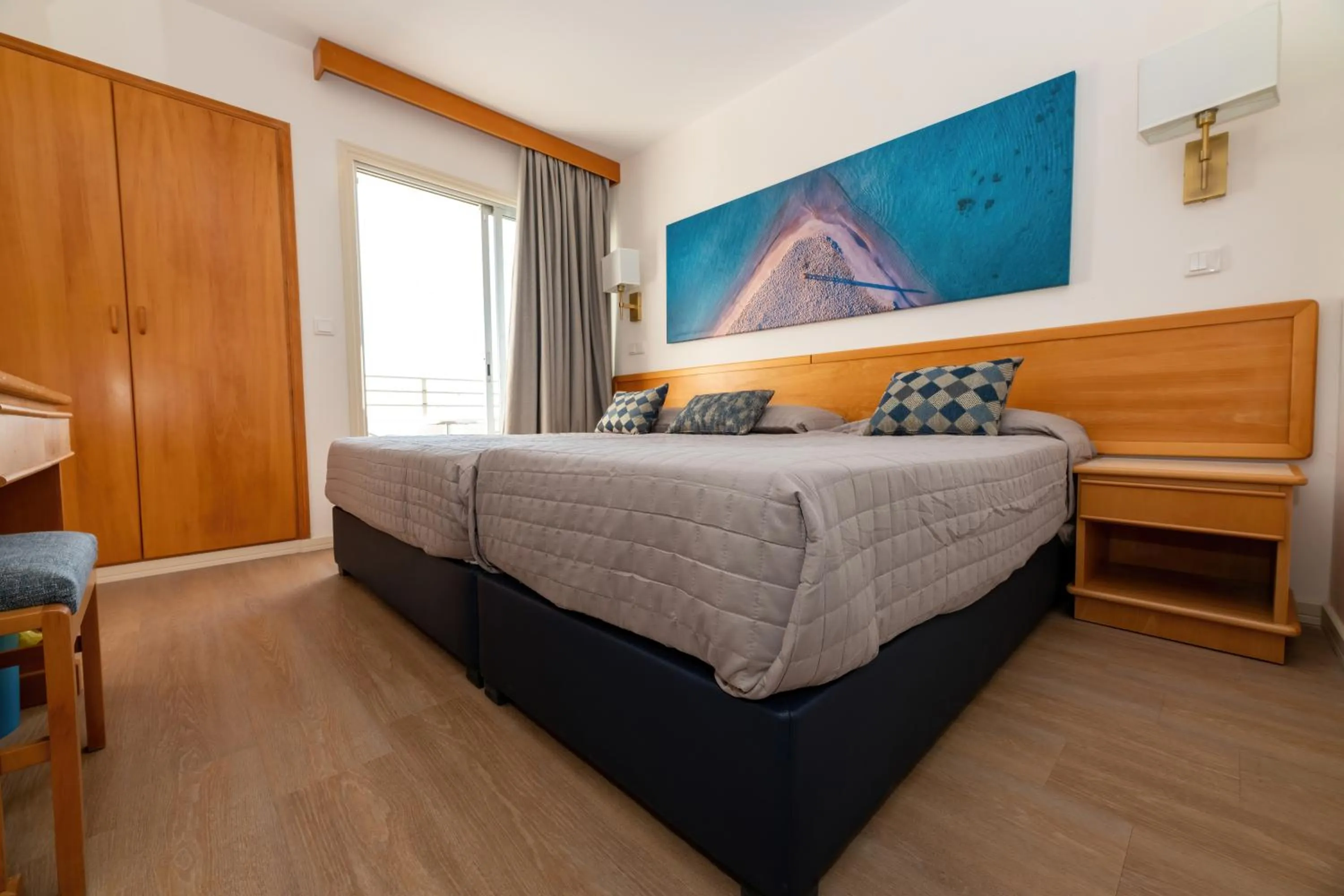 Bed in Tylos Beach Hotel