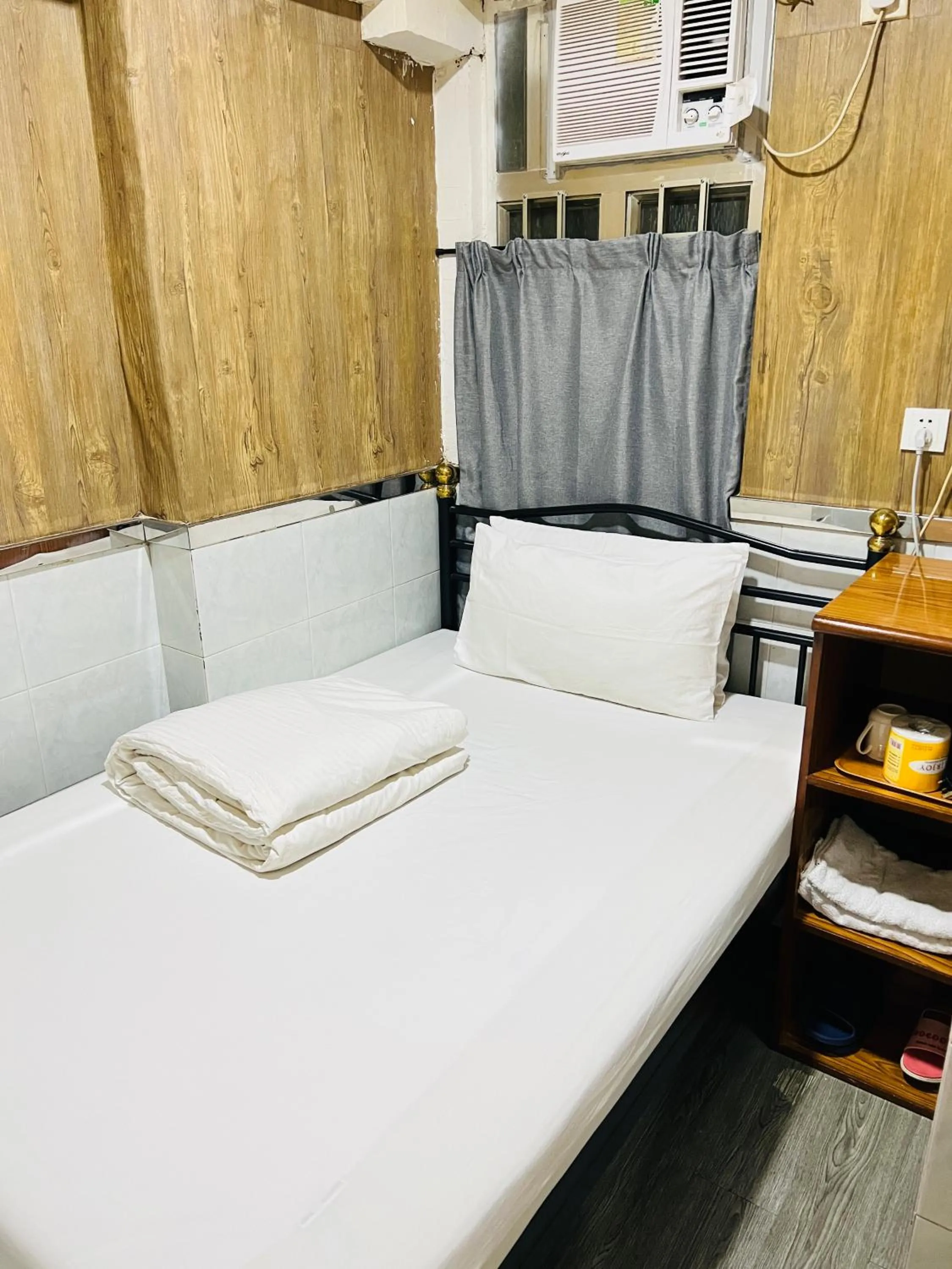 Bed in 嘉應賓館HAKKAS GUEST House