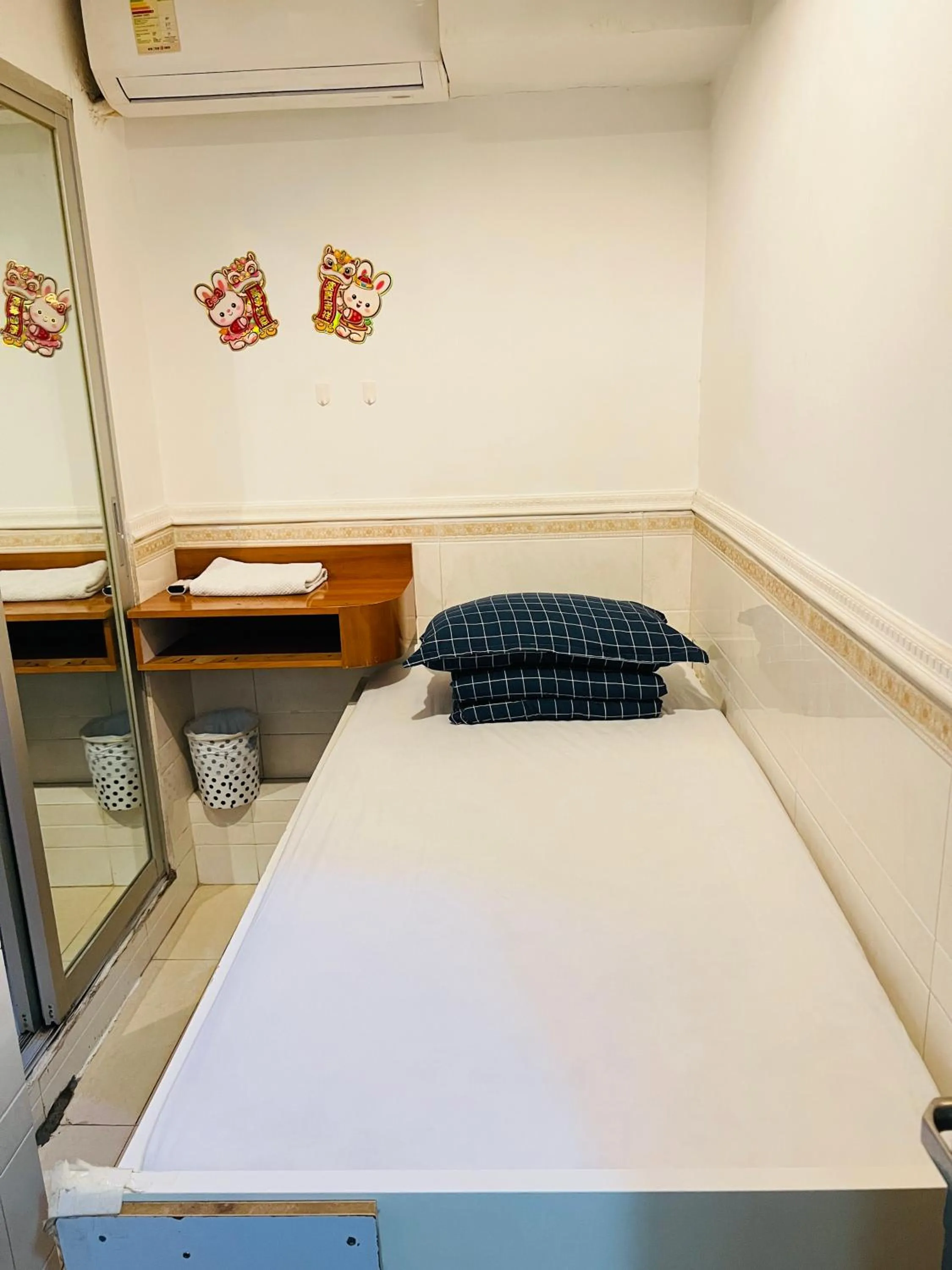 Bed in 嘉應賓館HAKKAS GUEST House