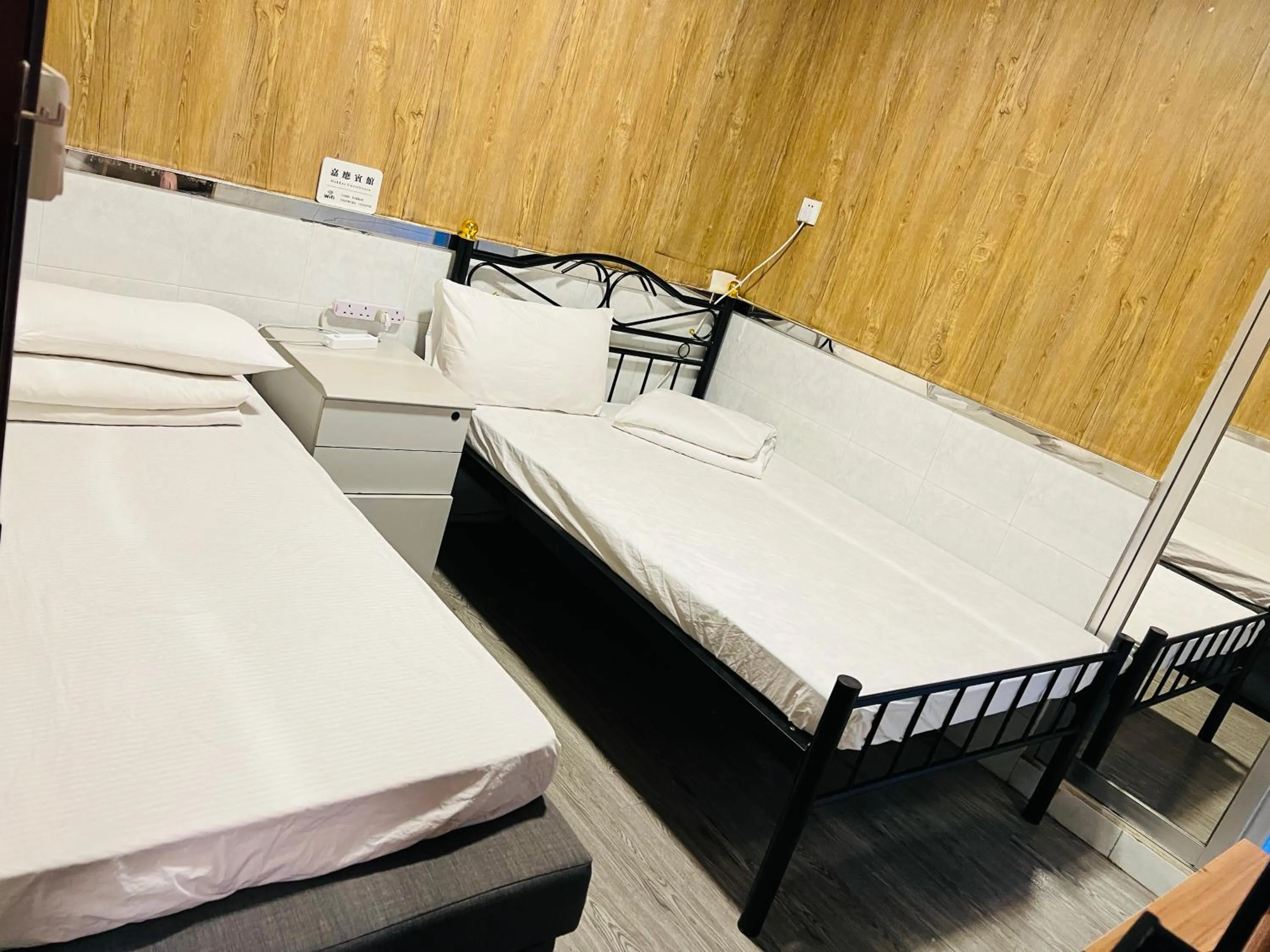 Bed in 嘉應賓館HAKKAS GUEST House