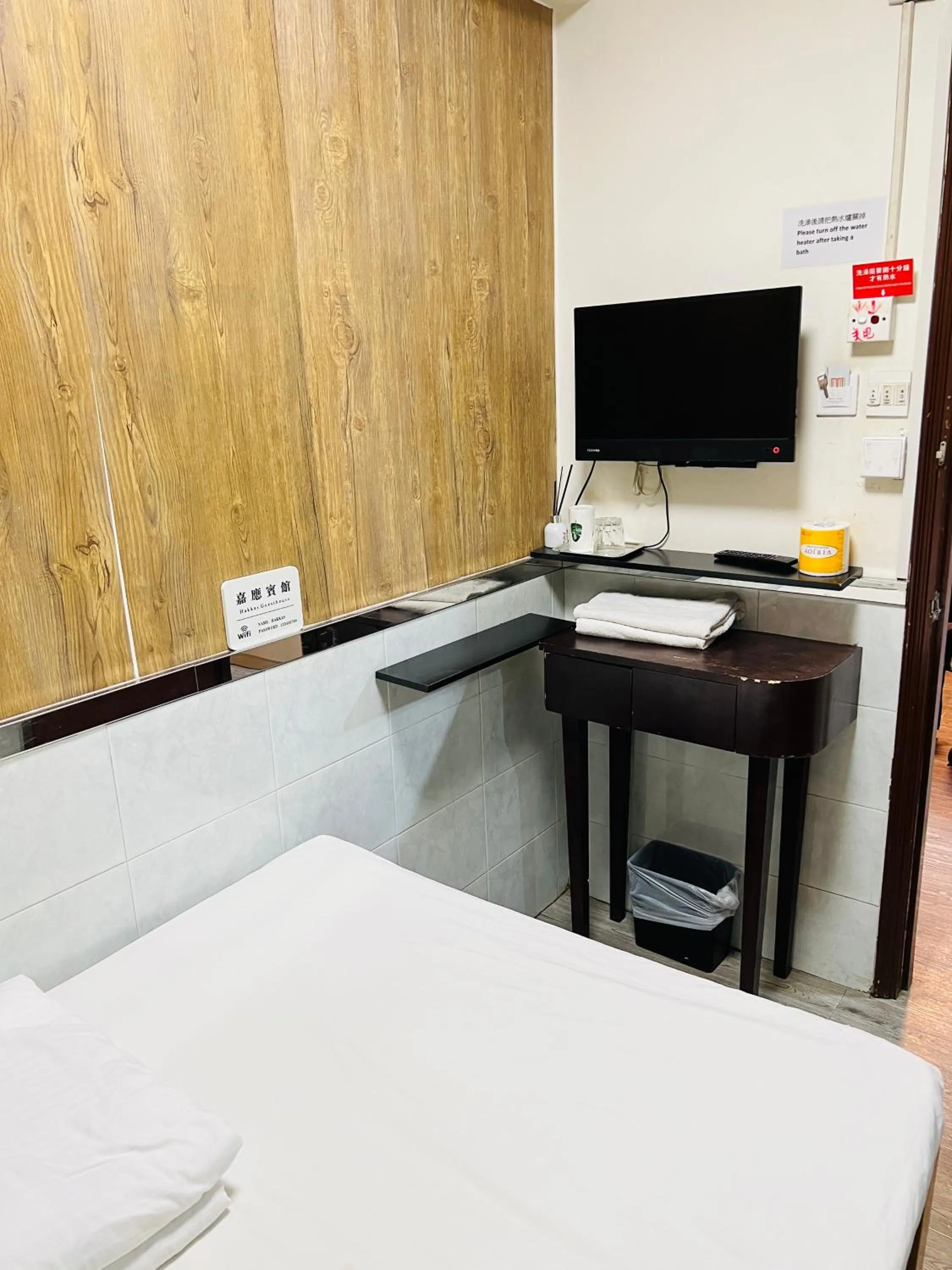 Bed in 嘉應賓館HAKKAS GUEST House