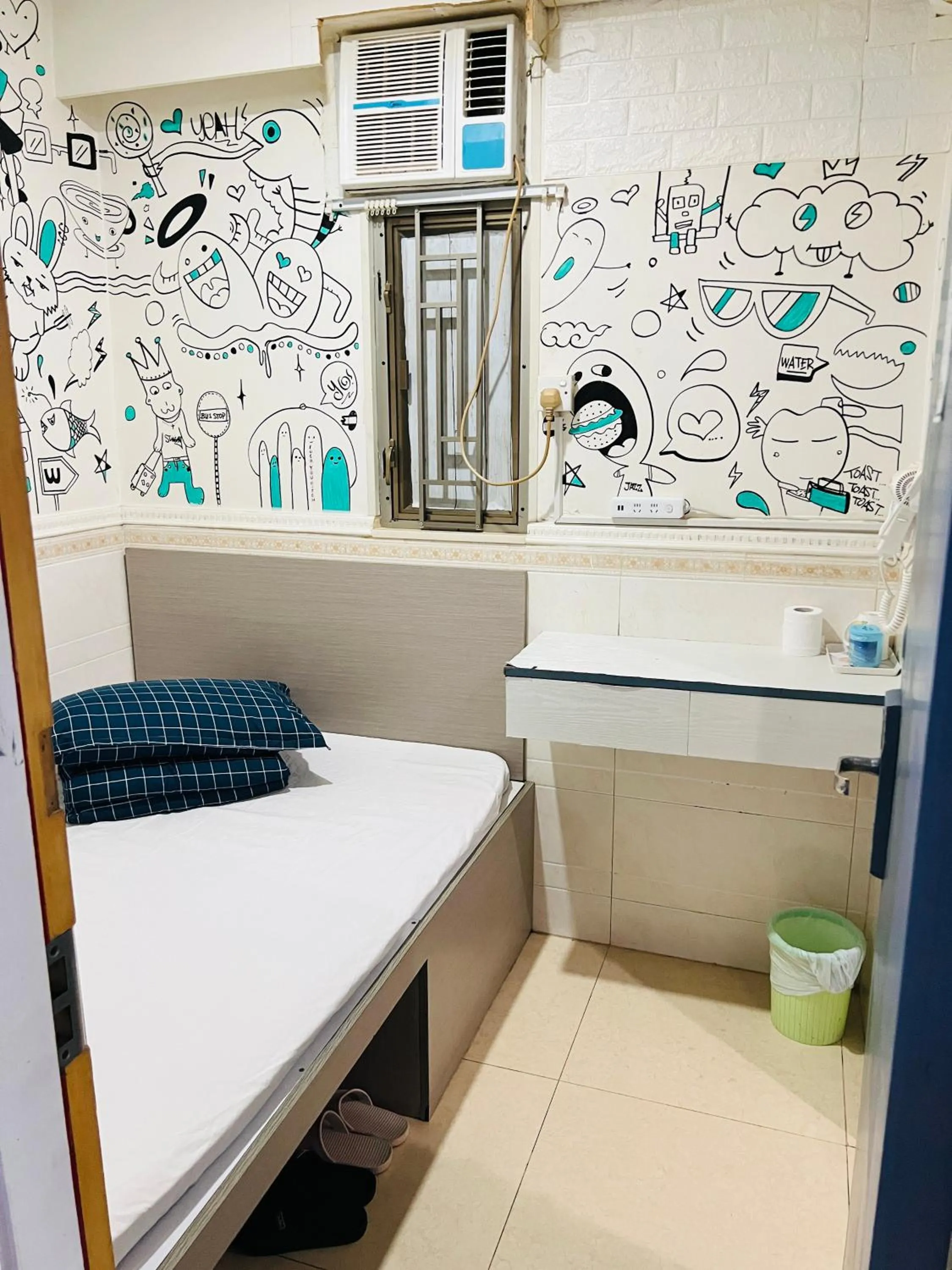 Bed in 嘉應賓館HAKKAS GUEST House