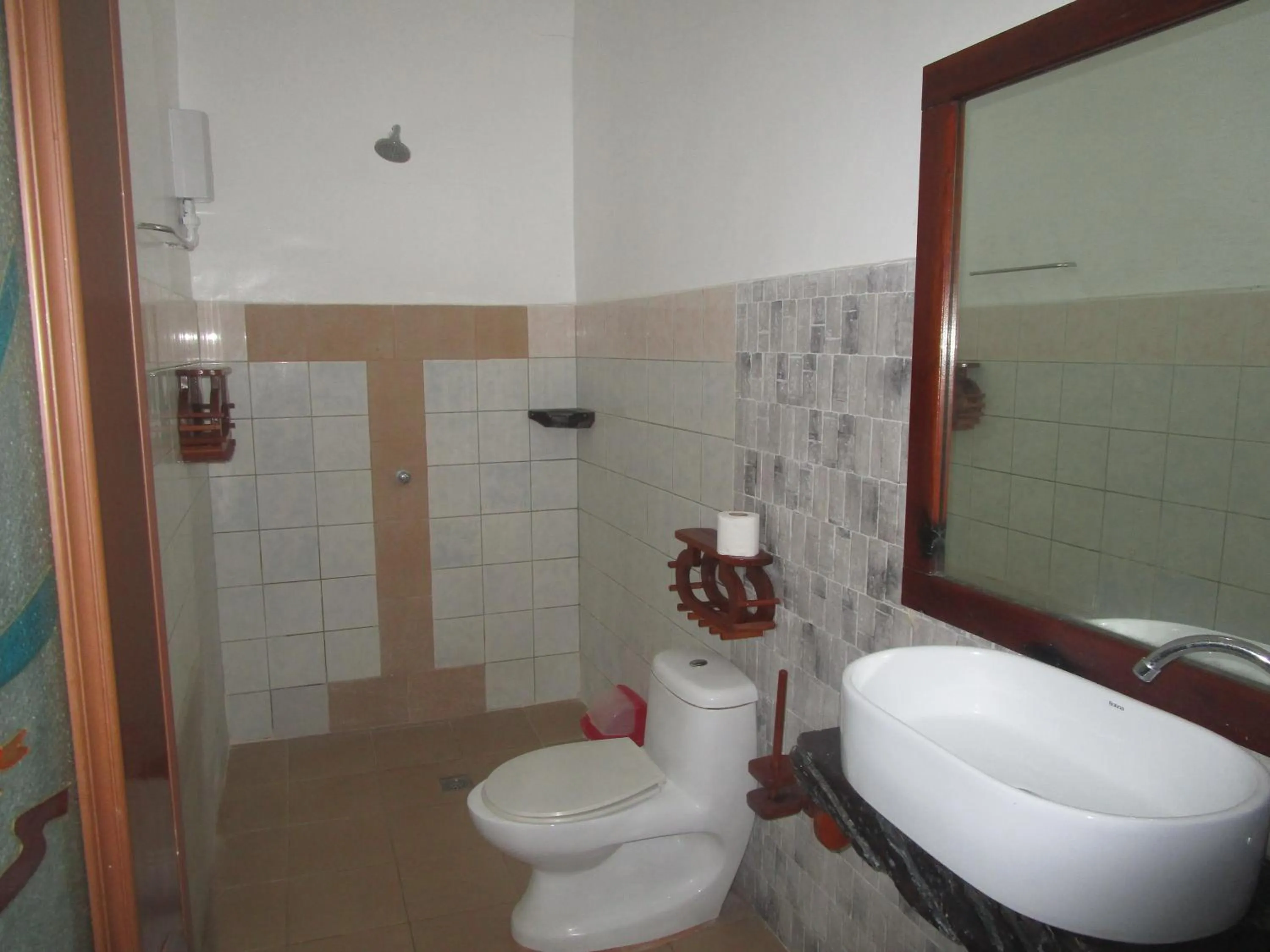 Toilet in Point 303 Resort