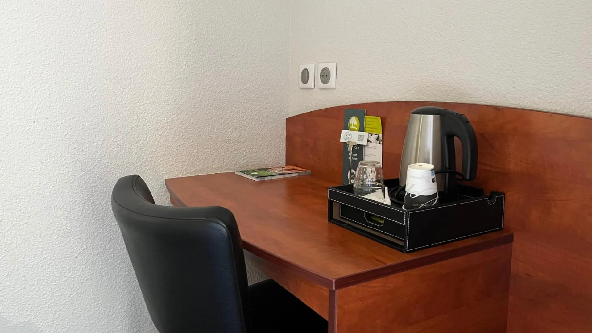 Bedroom in Hôtel du Golf Saint Lazare