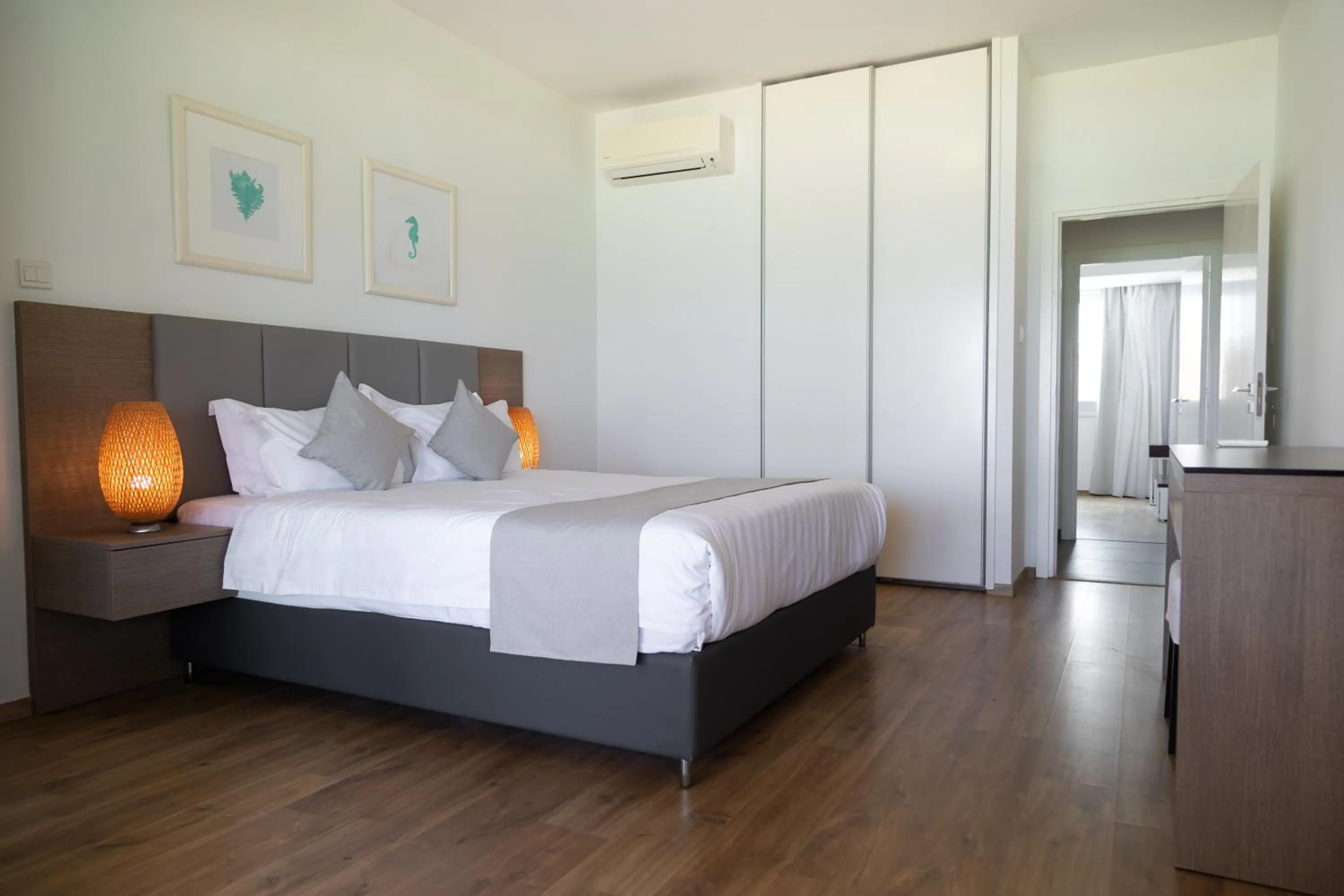 Bed in Elya Beach Luxury Suites