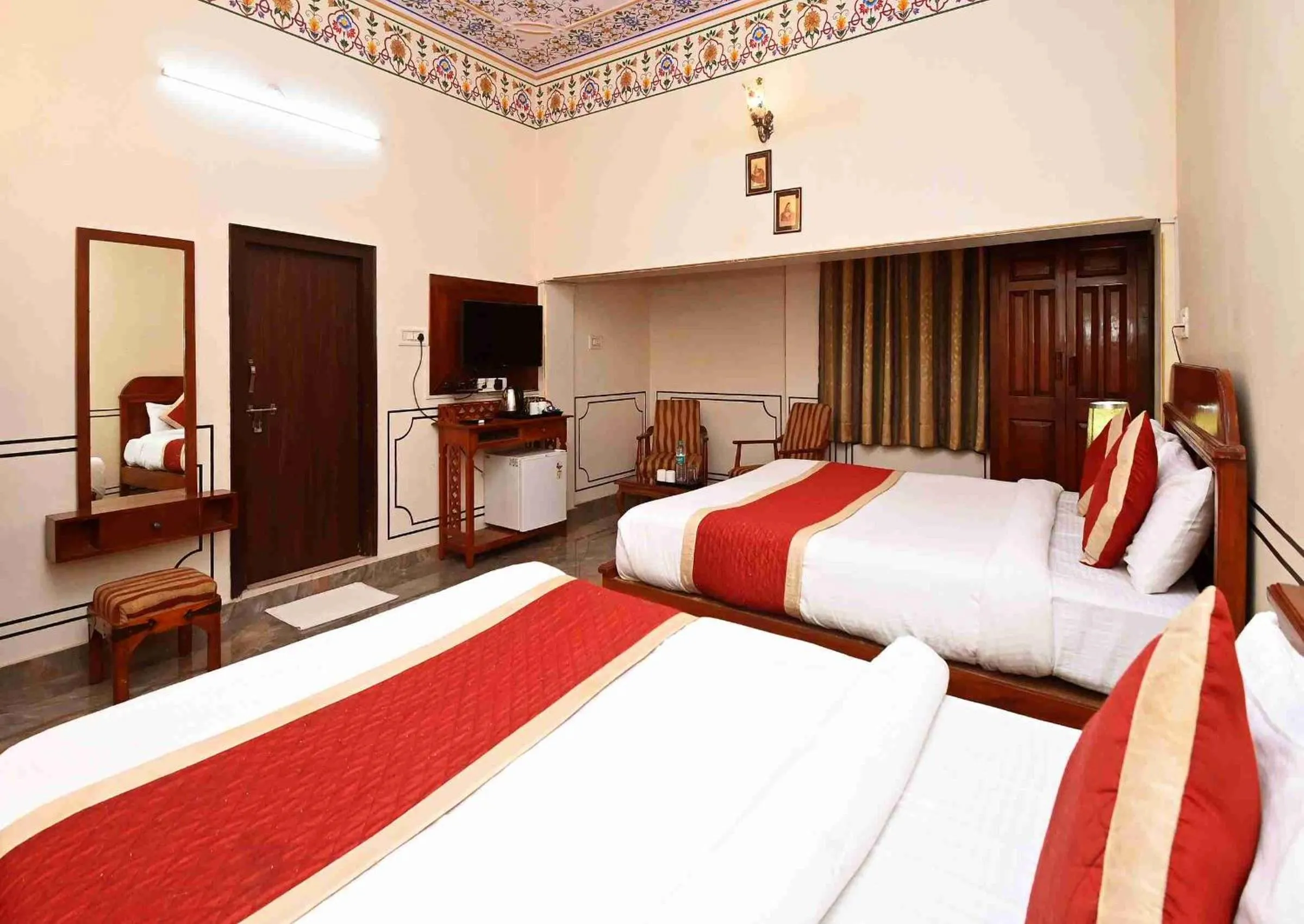 Bed in Virasat Mahal Heritage Hotel-Jaipur City Center