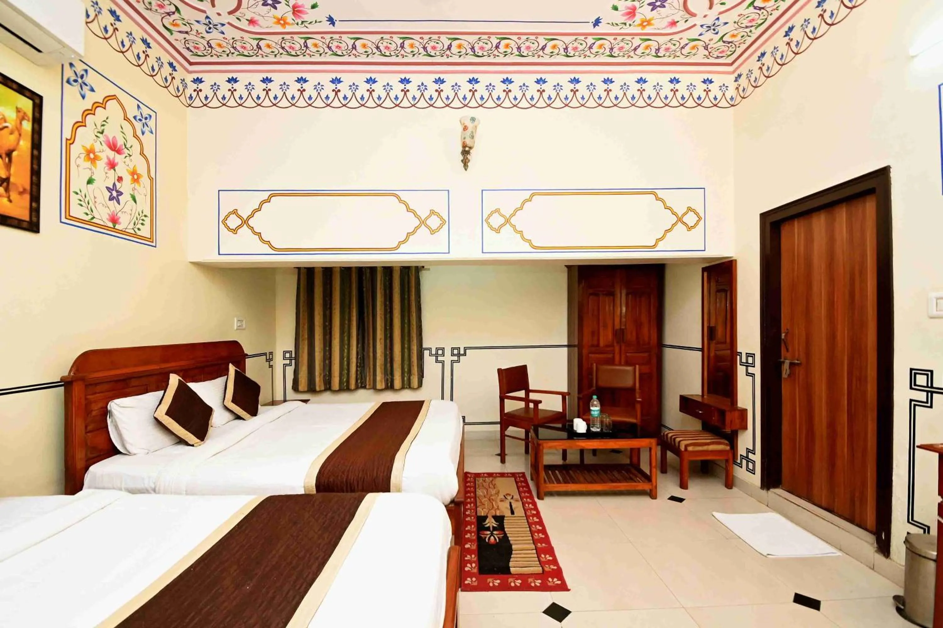 Bed in Virasat Mahal Heritage Hotel-Jaipur City Center