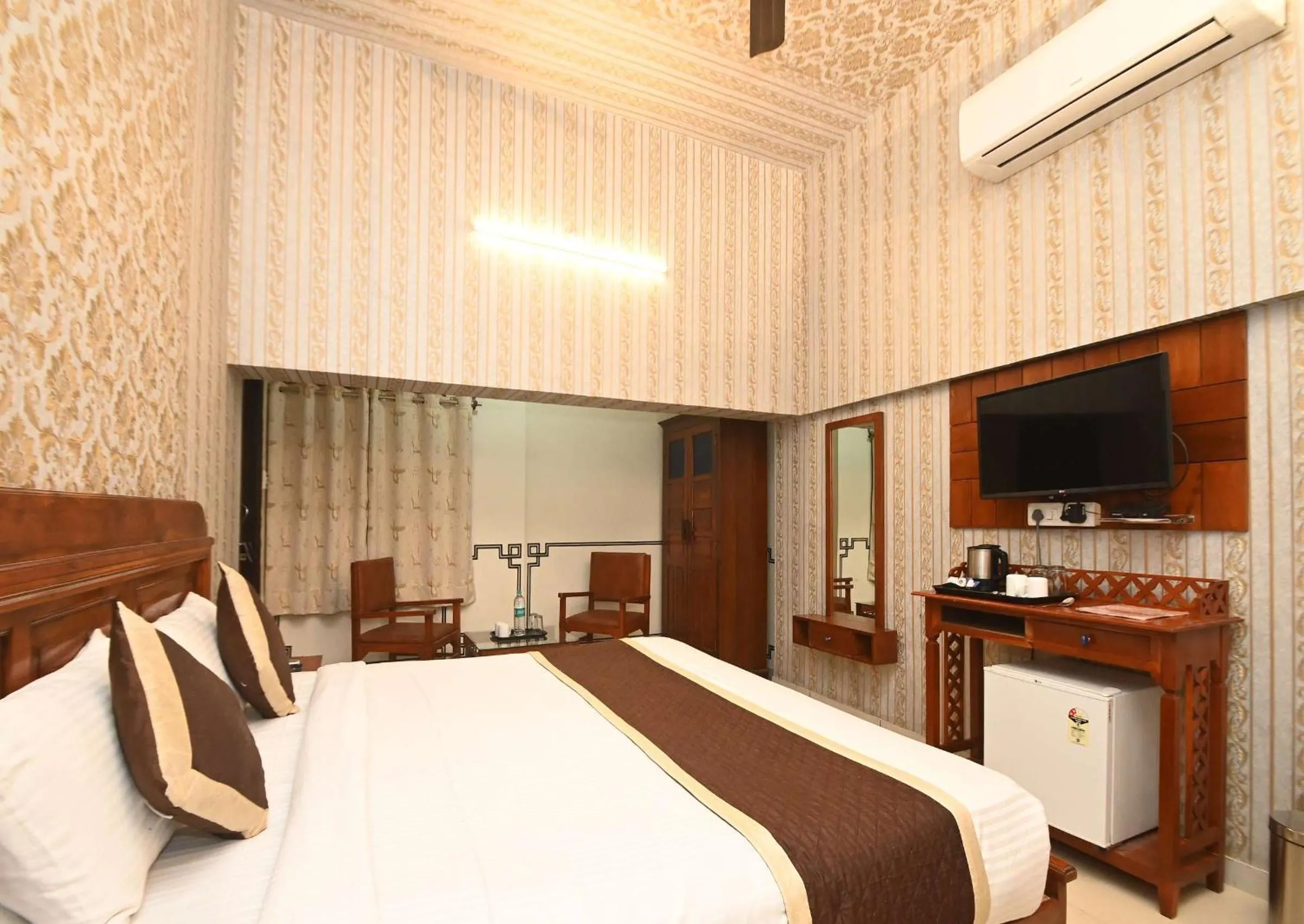 Bed in Virasat Mahal Heritage Hotel-Jaipur City Center