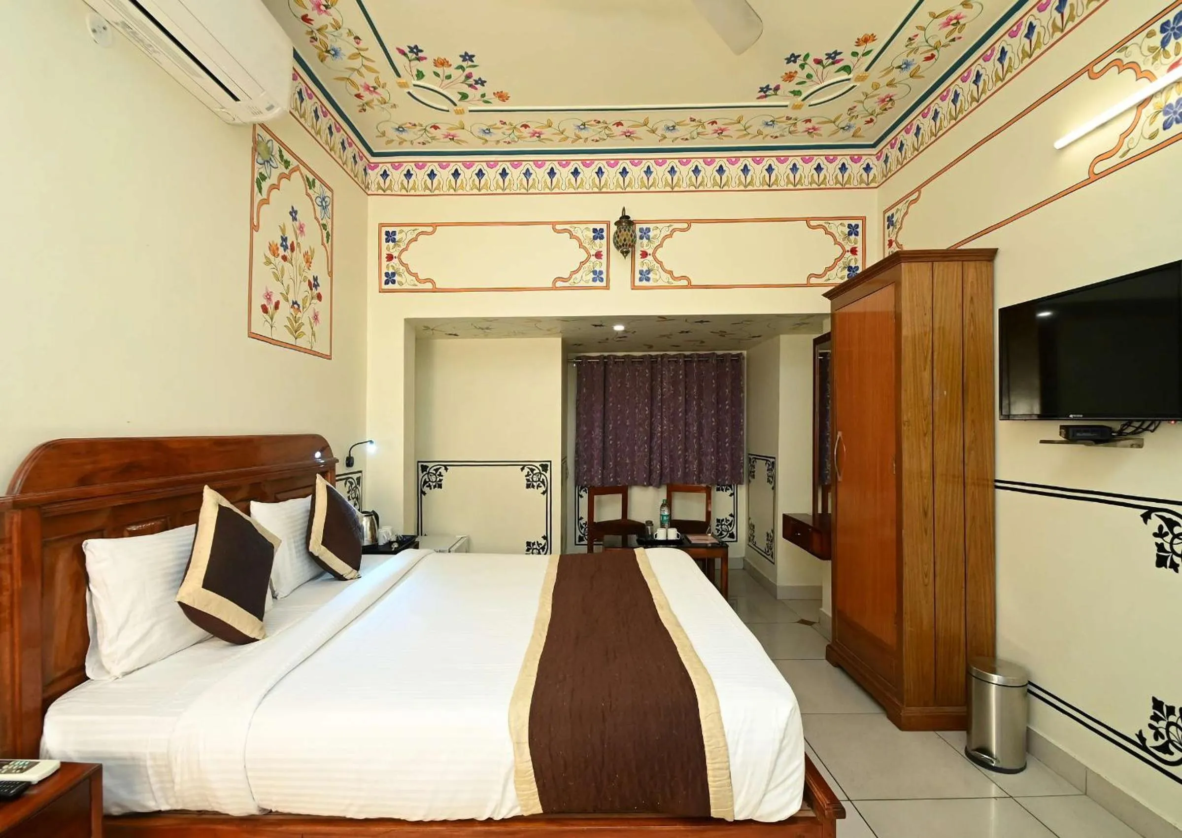 Bed in Virasat Mahal Heritage Hotel-Jaipur City Center
