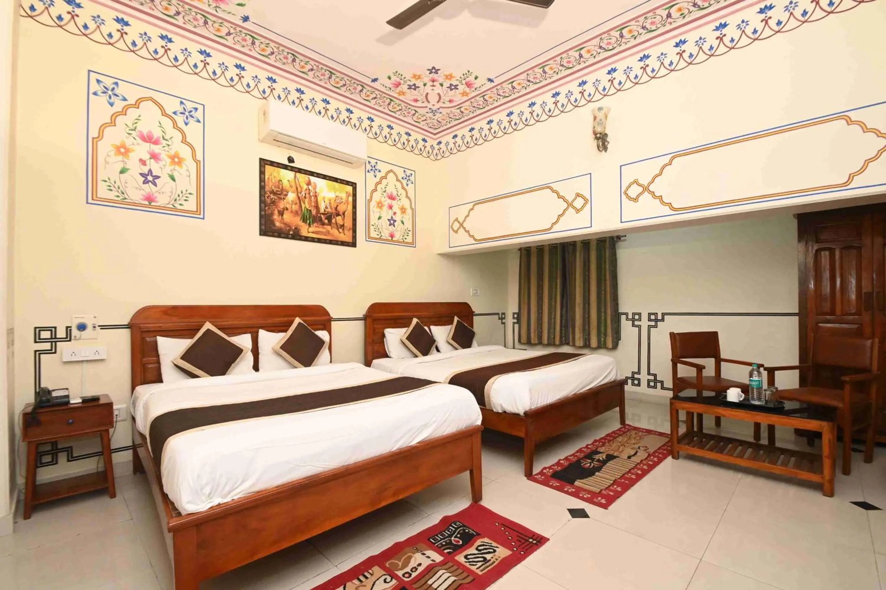 Bed in Virasat Mahal Heritage Hotel-Jaipur City Center