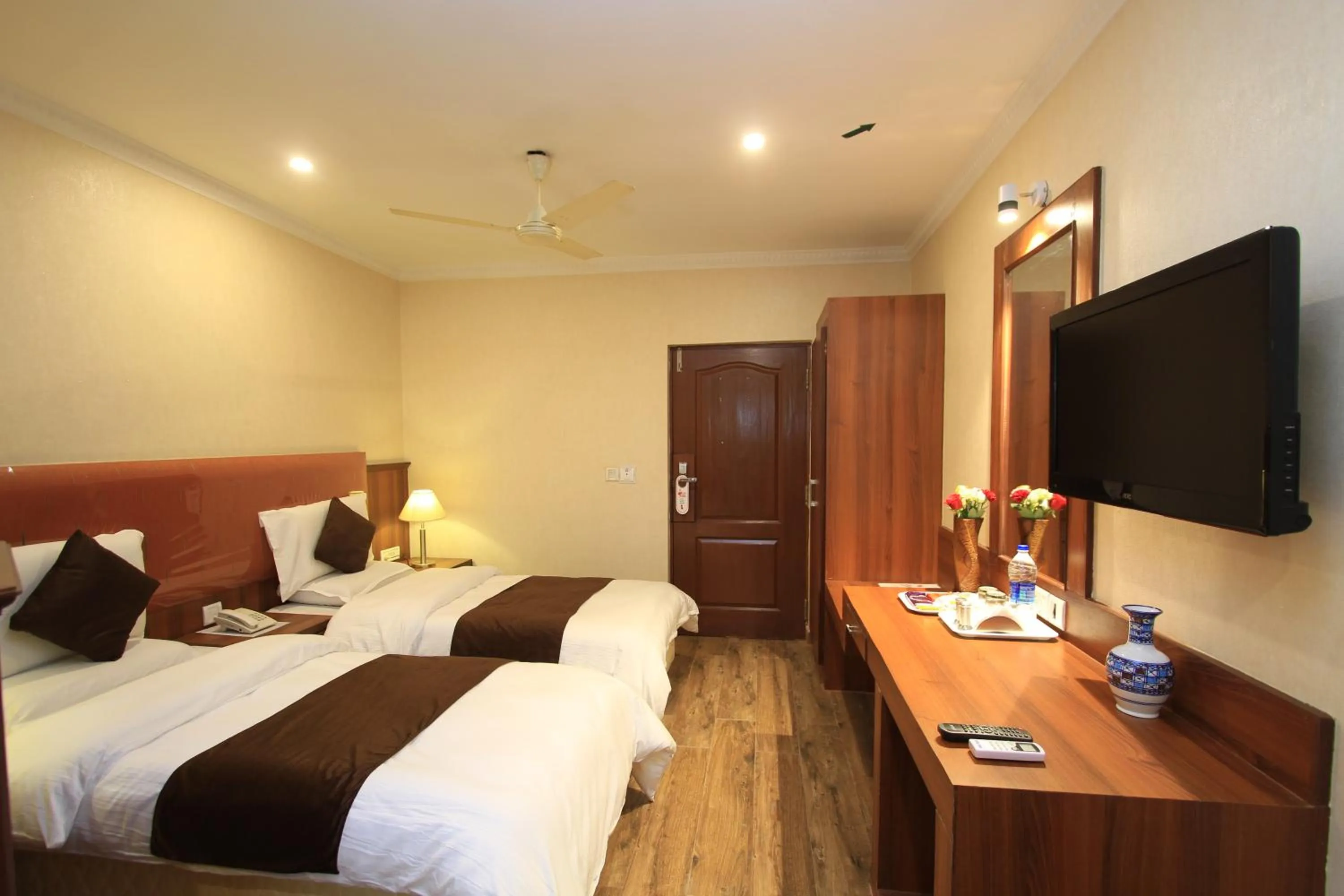 Bed in Hotel Noor Empire International Kormangala