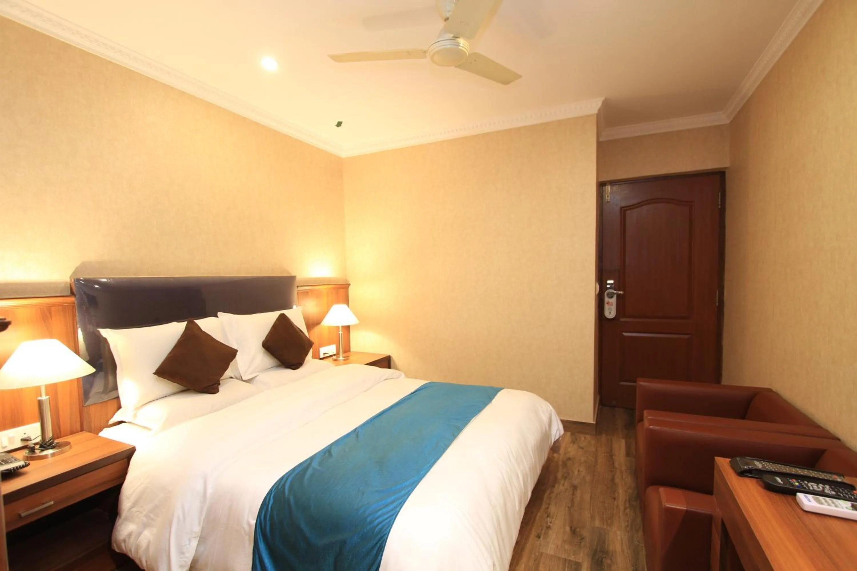 Bed in Hotel Noor Empire International Kormangala