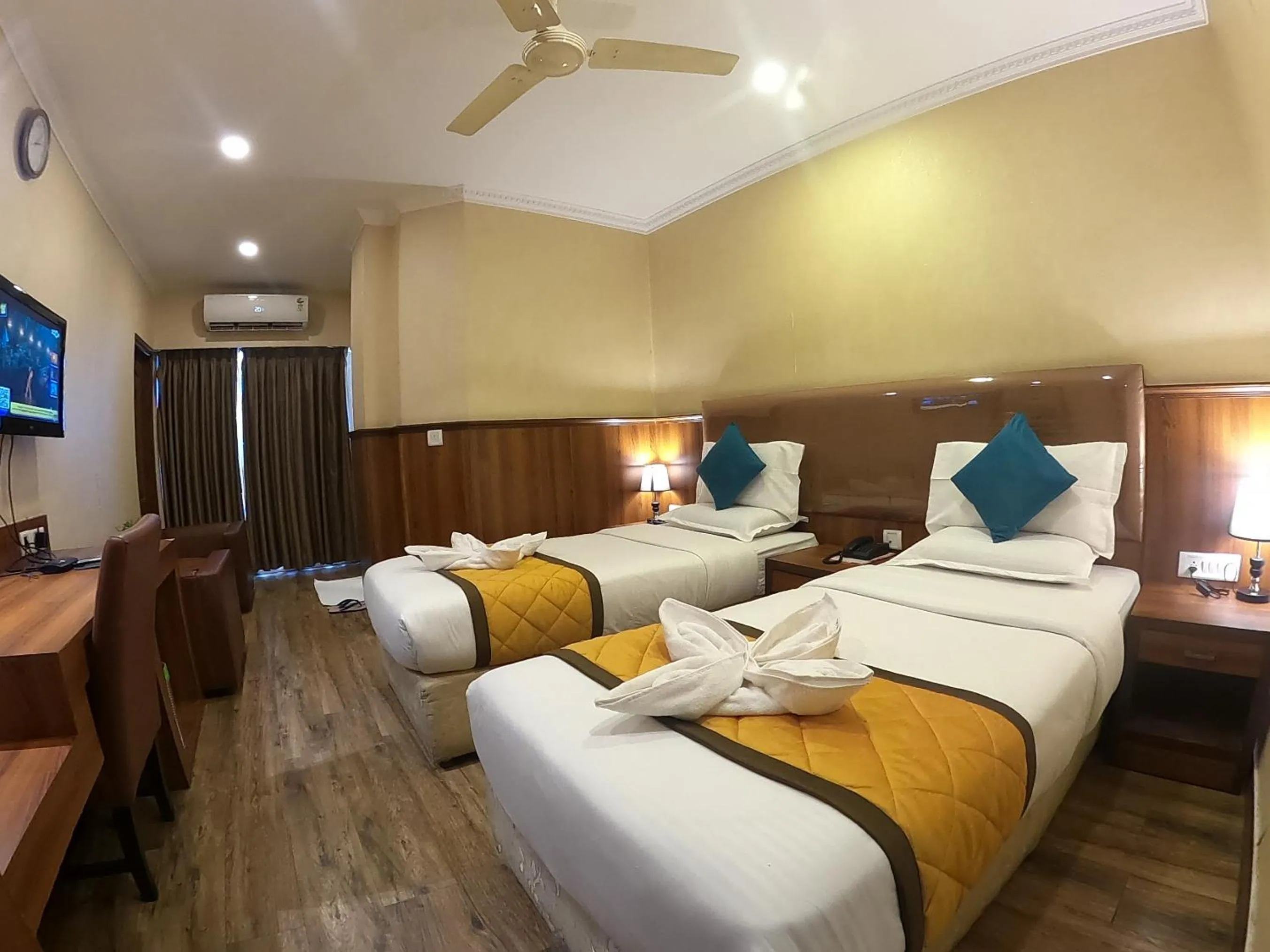 Bed in Hotel Noor Empire International Kormangala