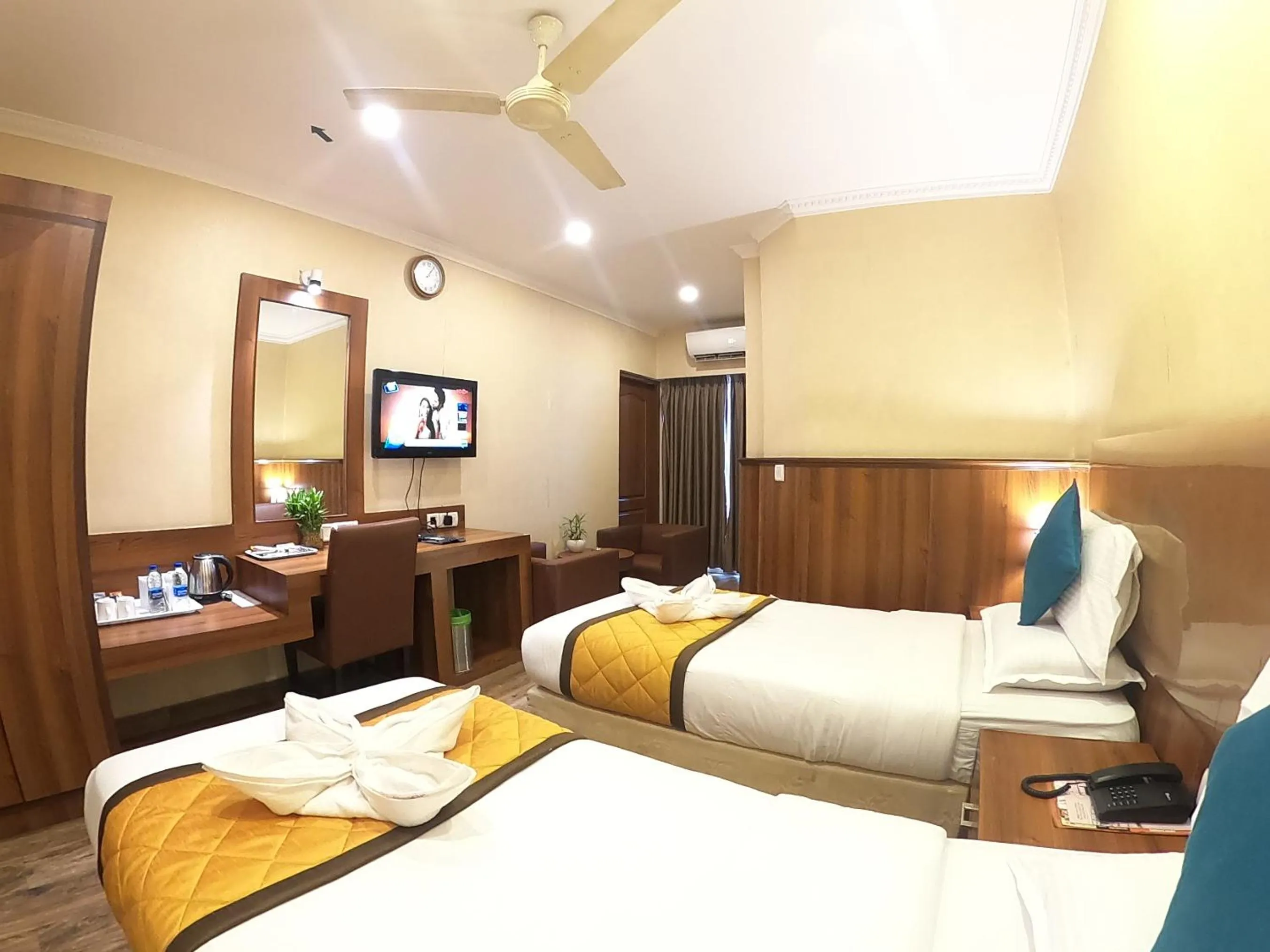 Bed in Hotel Noor Empire International Kormangala