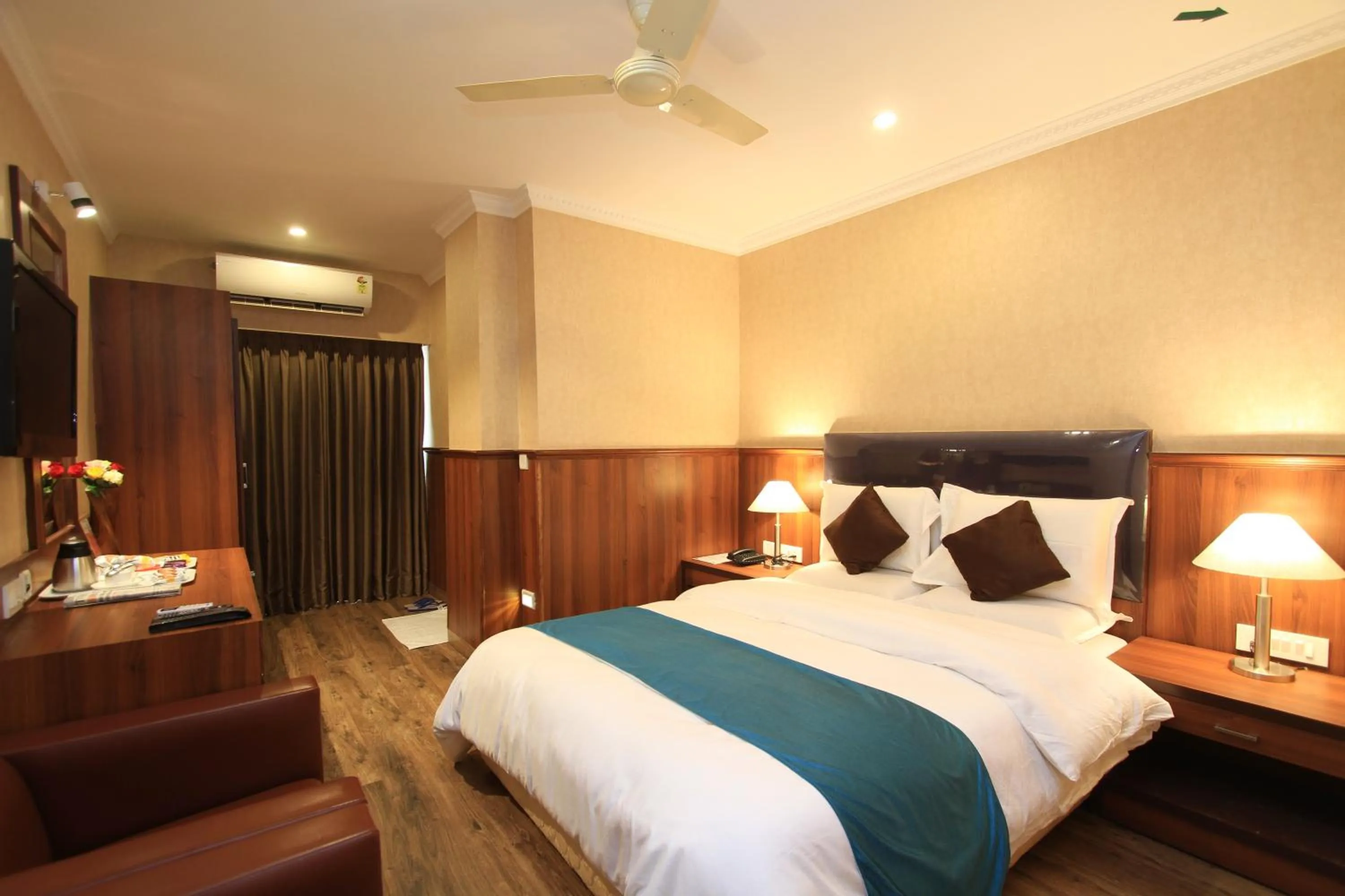 Bed in Hotel Noor Empire International Kormangala