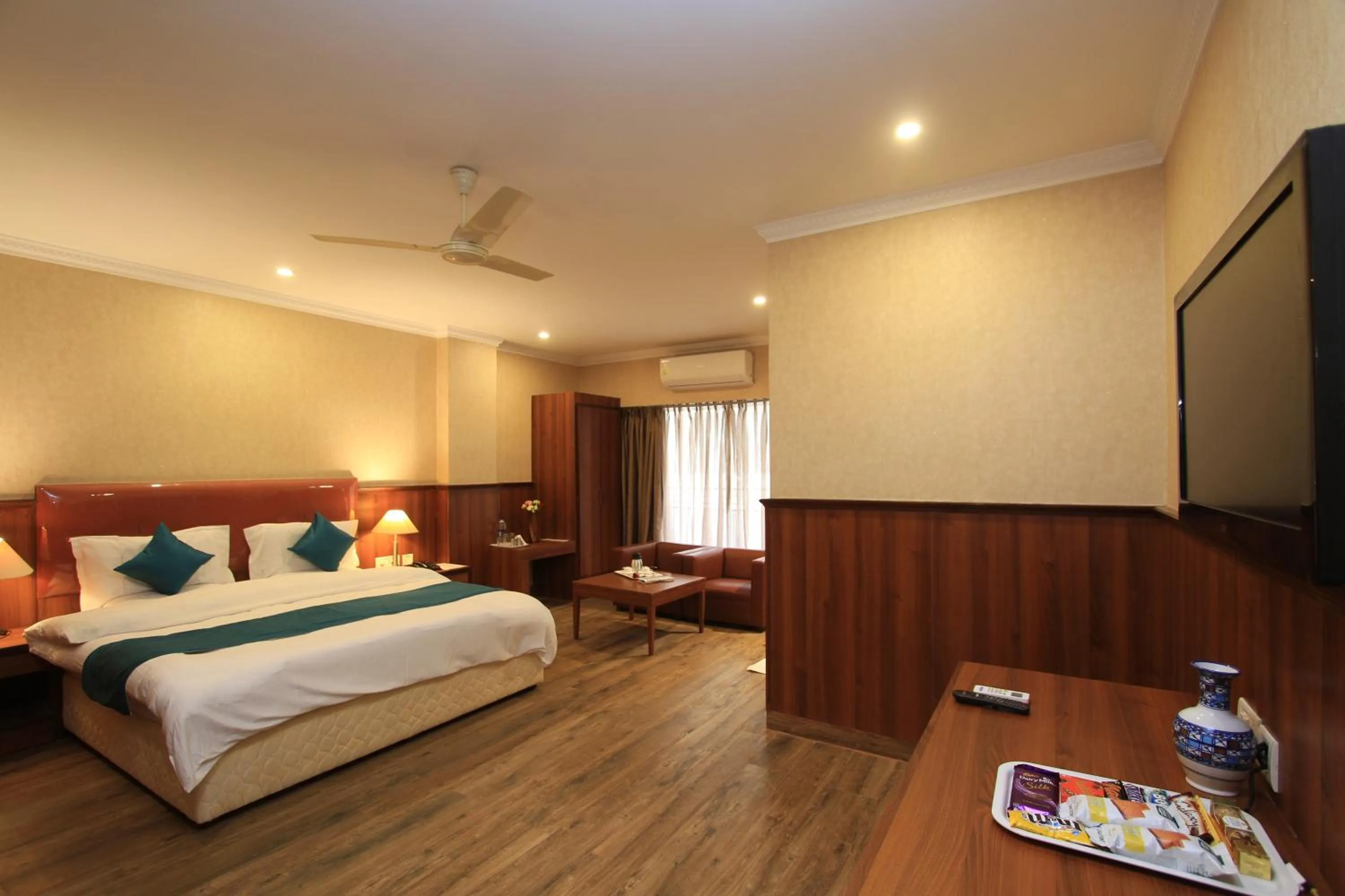 Bed in Hotel Noor Empire International Kormangala