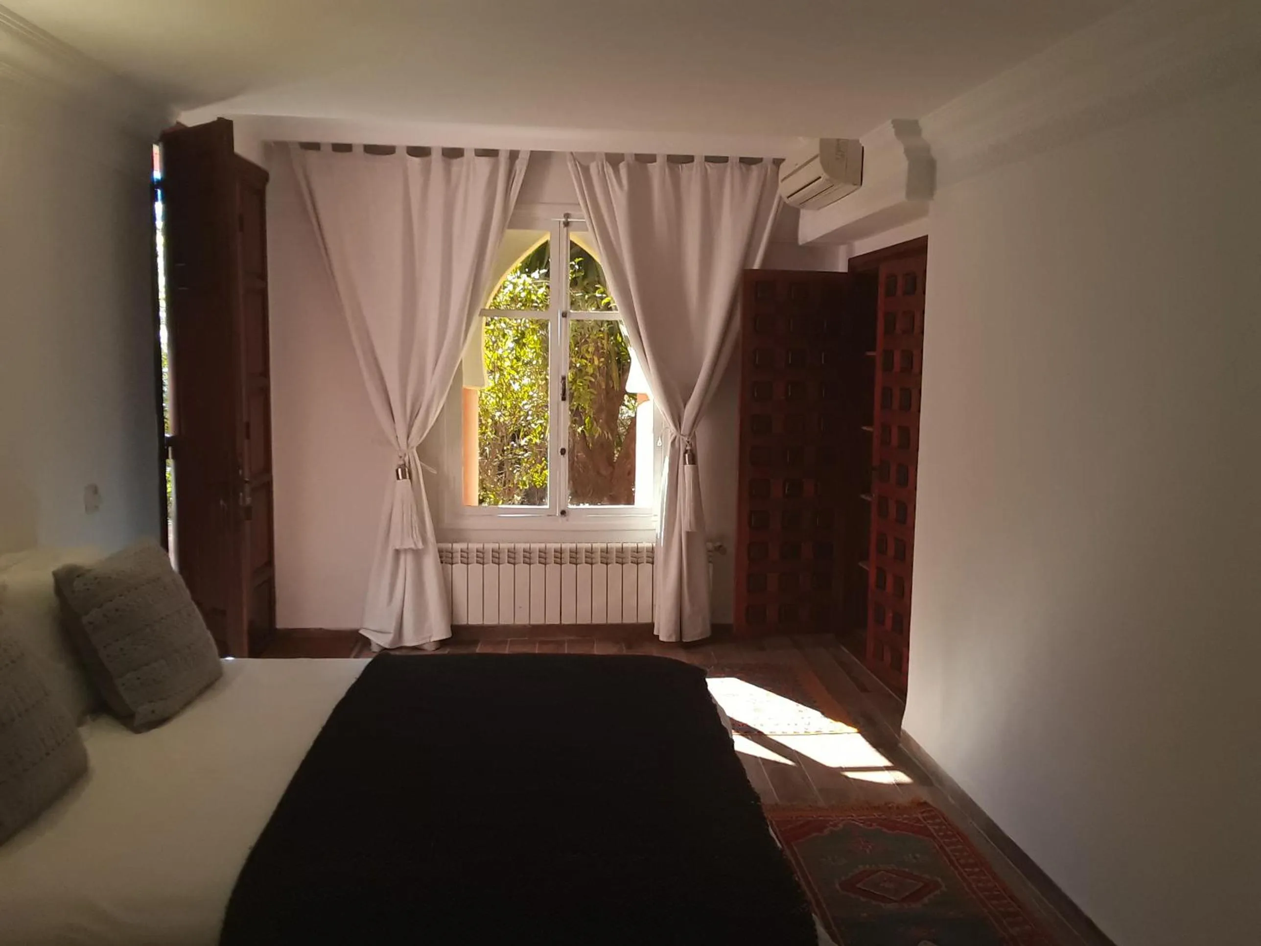 Bed in Domaine de la Roseraie Resort