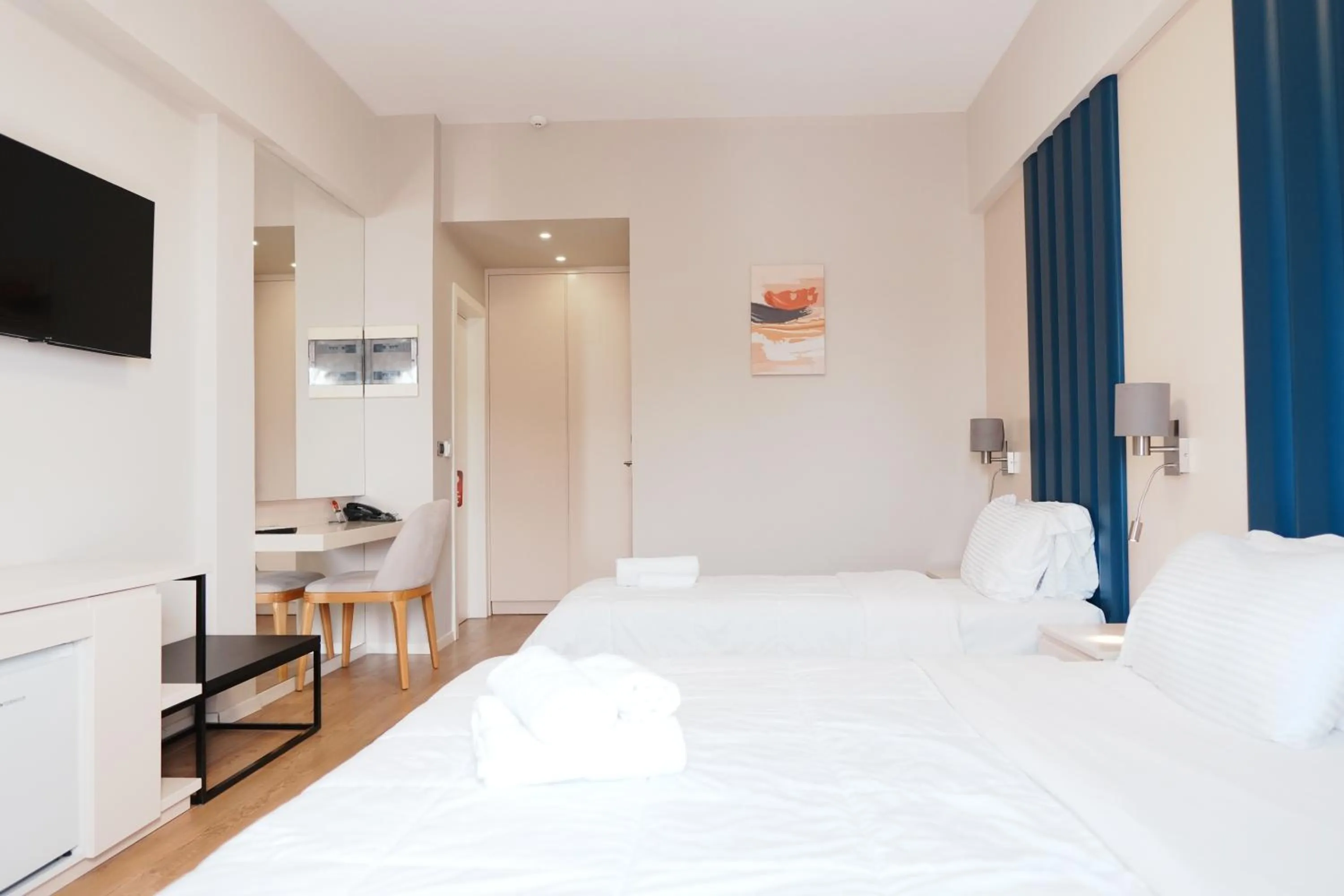 Communal lounge/ TV room in Hotel Blue Sky