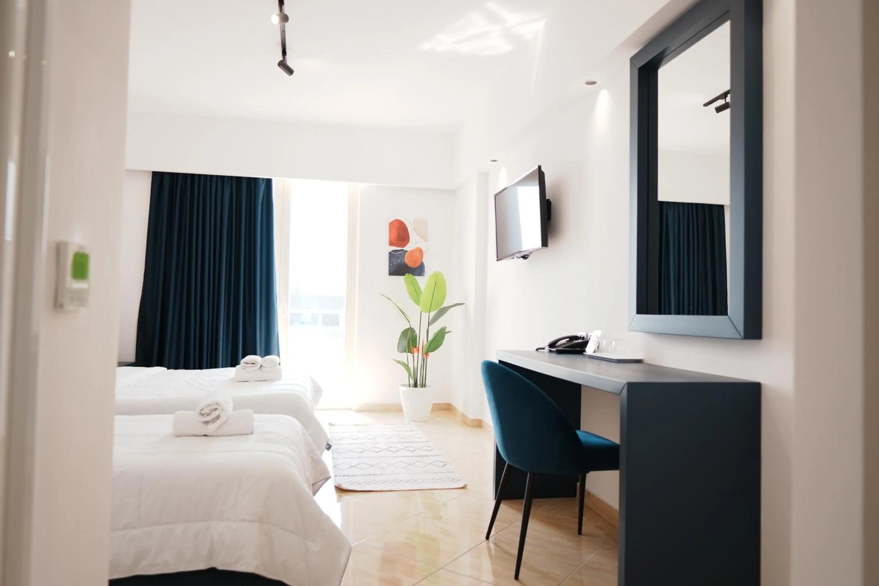 Communal lounge/ TV room in Hotel Blue Sky