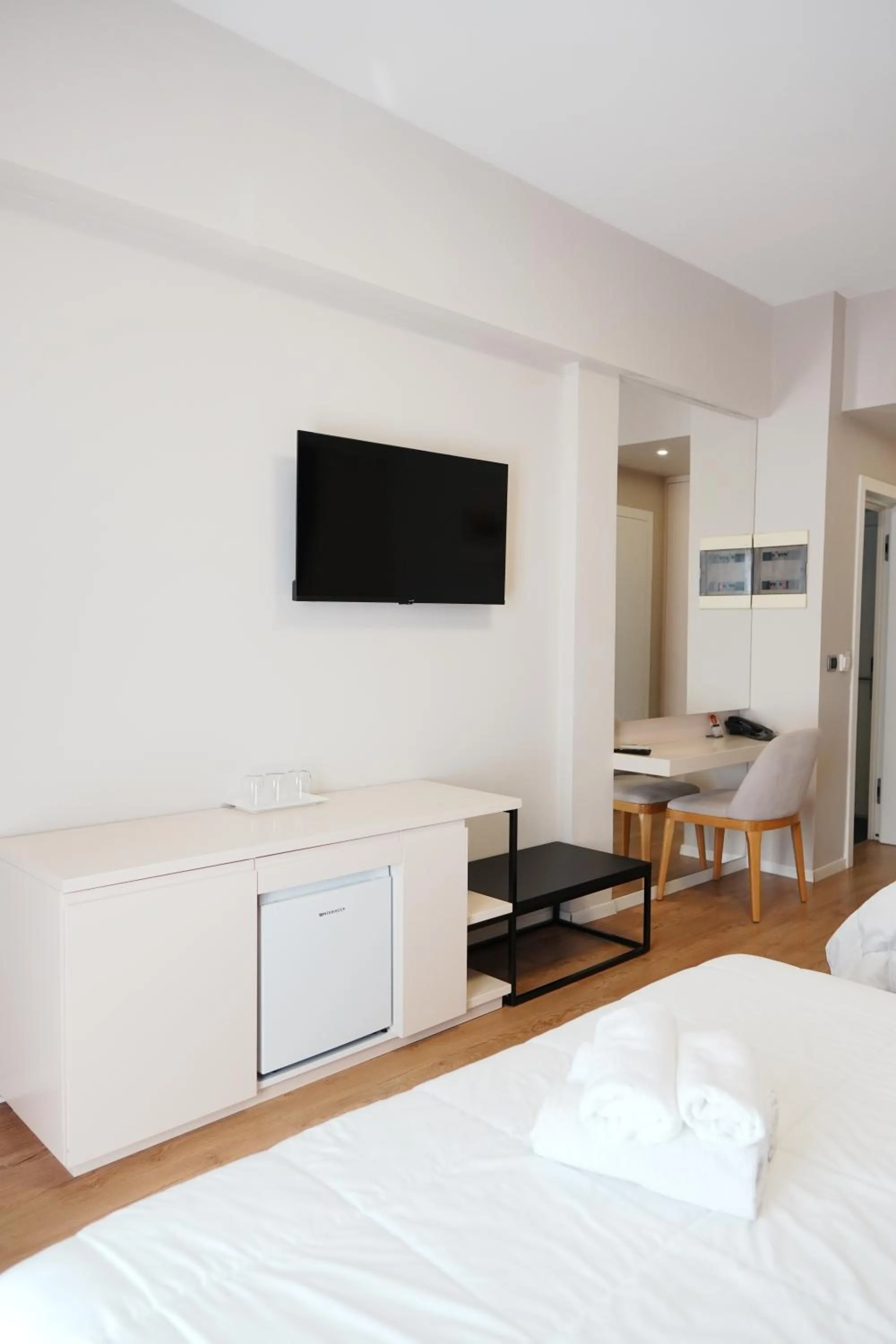 Communal lounge/ TV room in Hotel Blue Sky