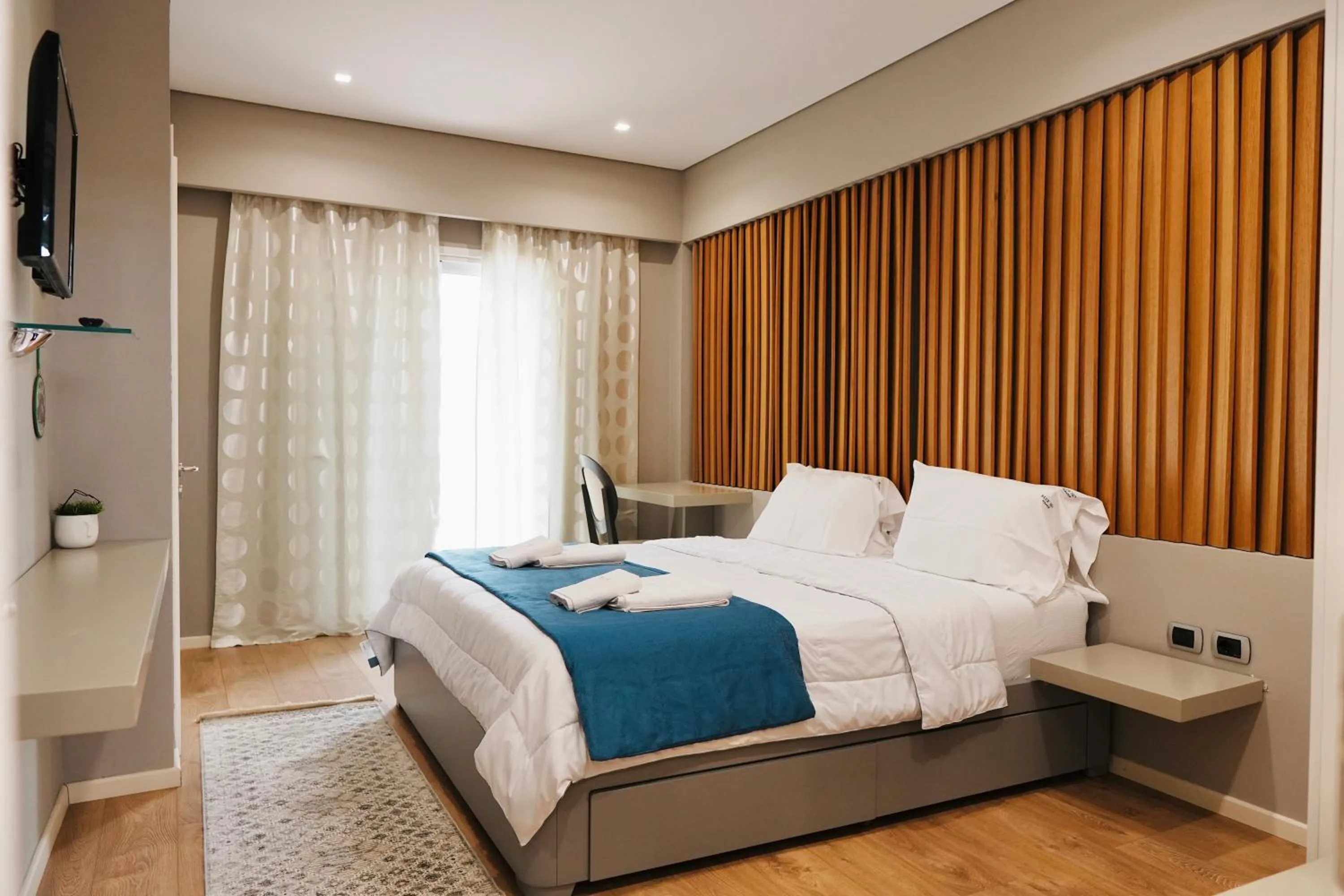 Bed in Hotel Blue Sky