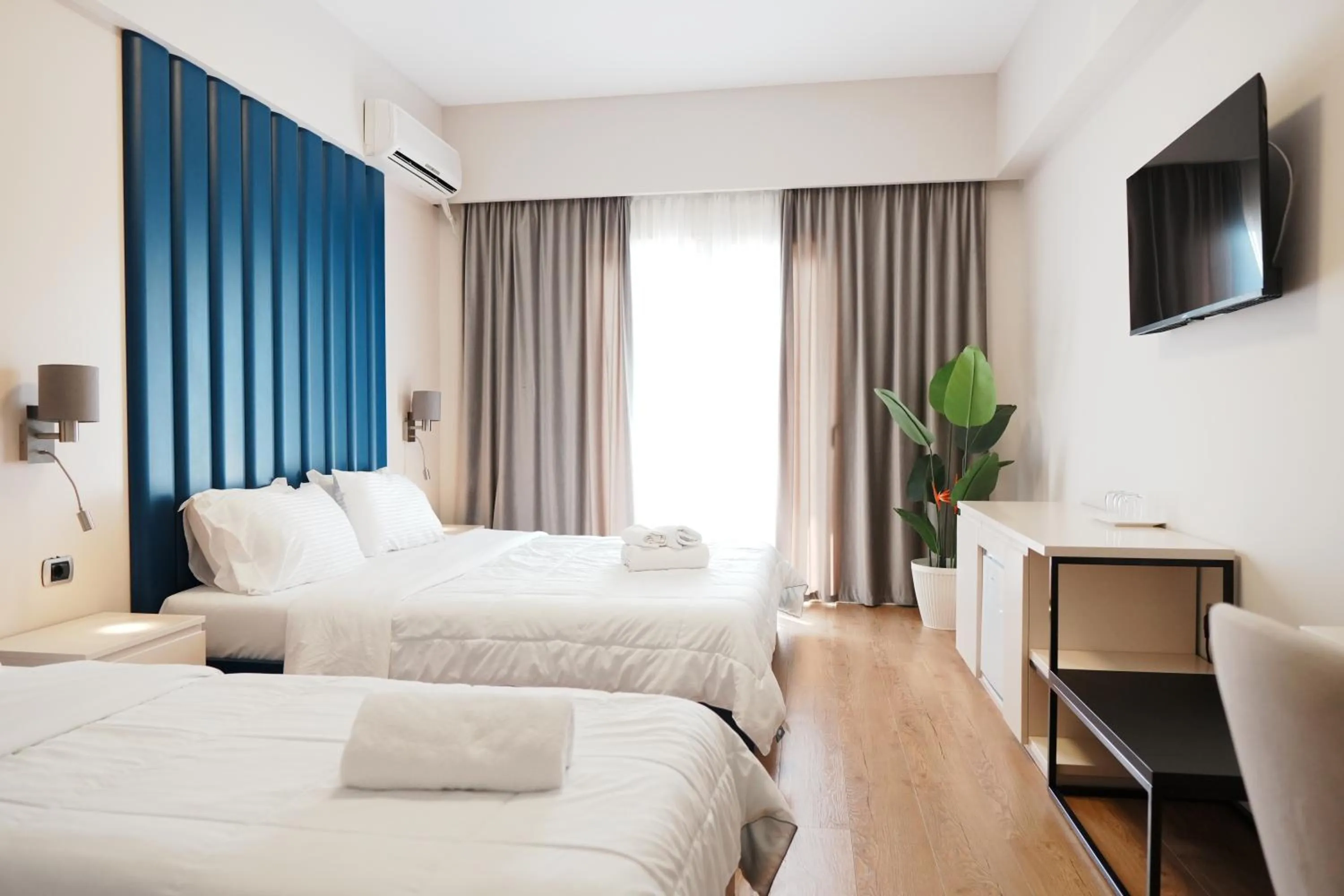 Communal lounge/ TV room in Hotel Blue Sky