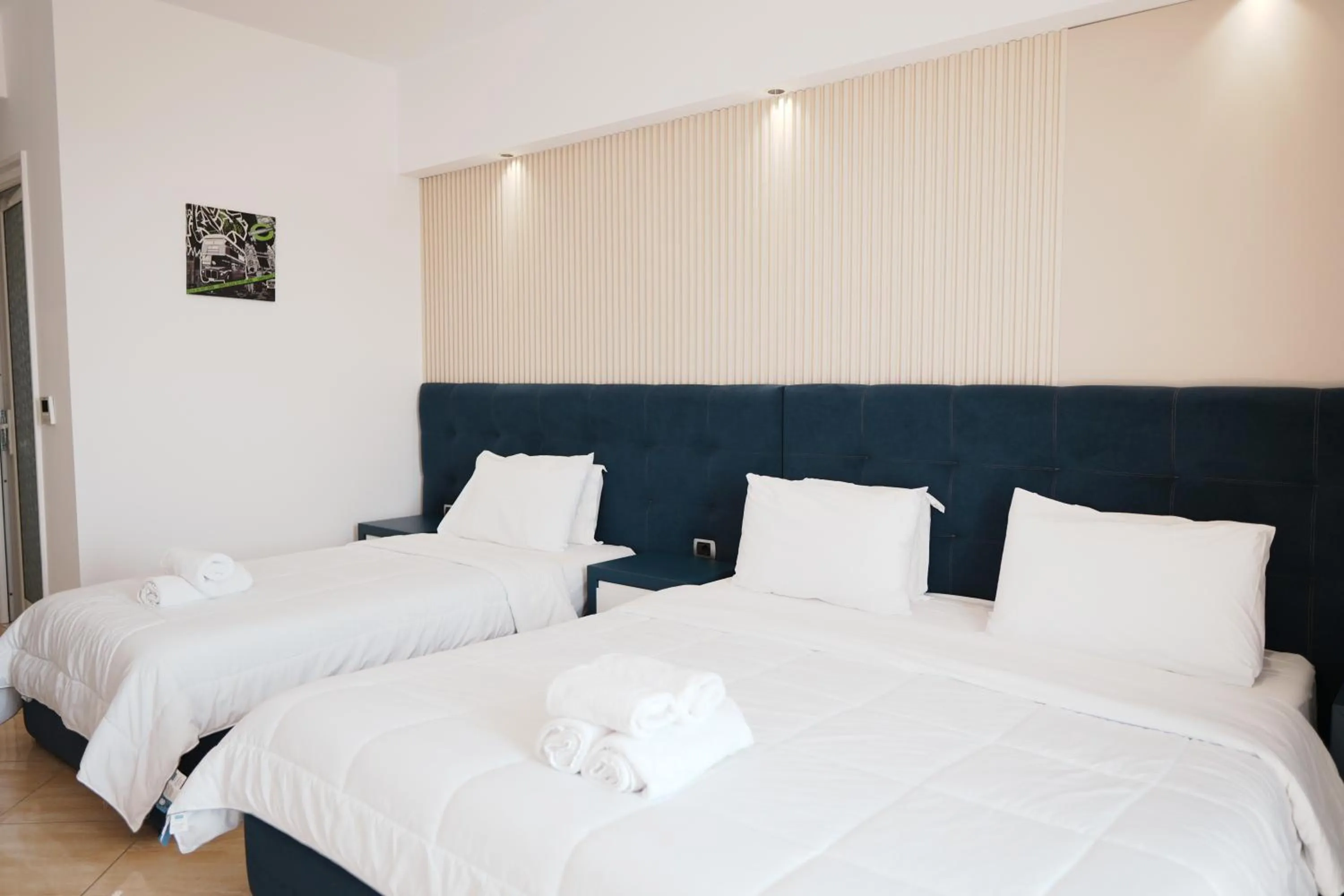 Bed in Hotel Blue Sky