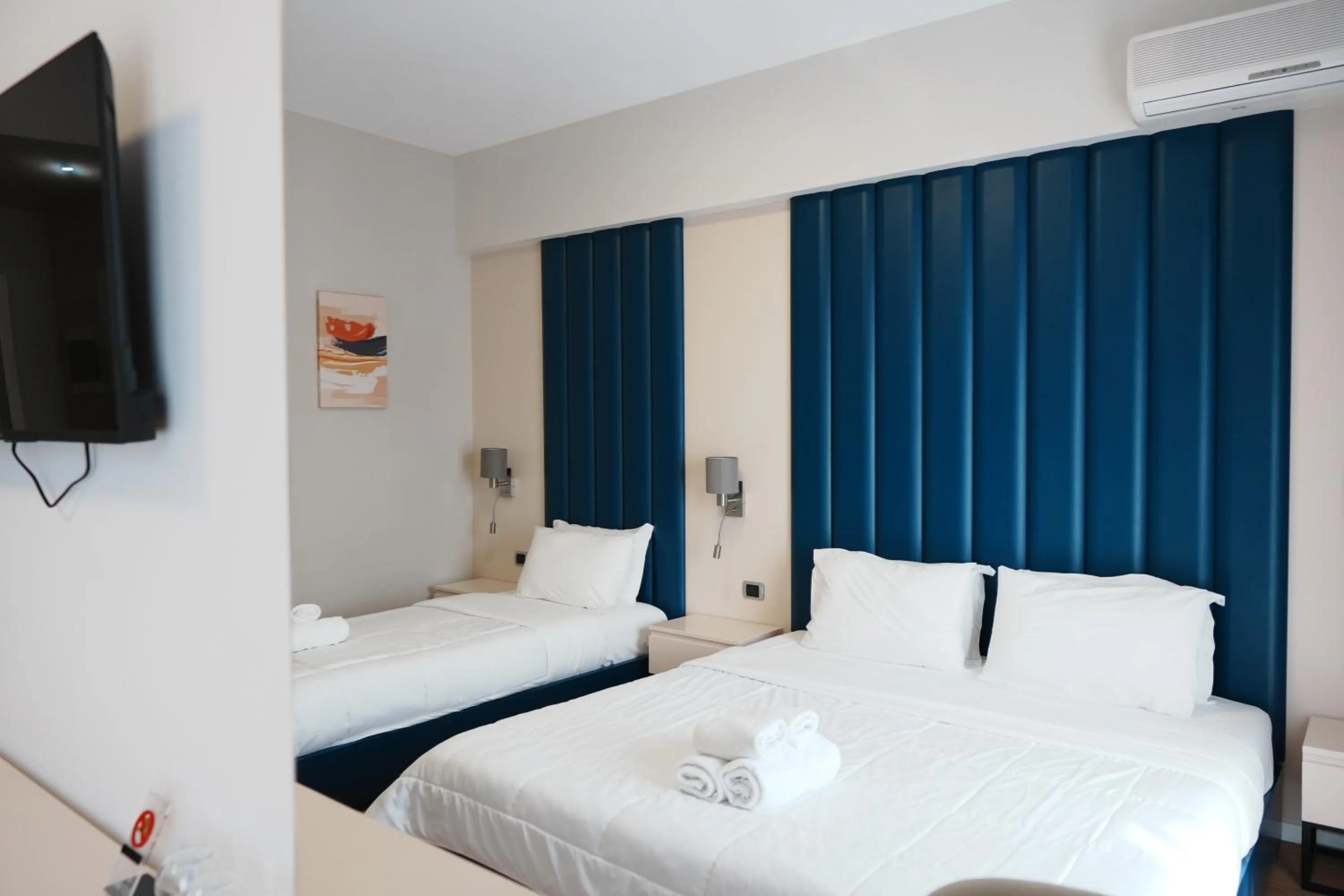 Communal lounge/ TV room in Hotel Blue Sky