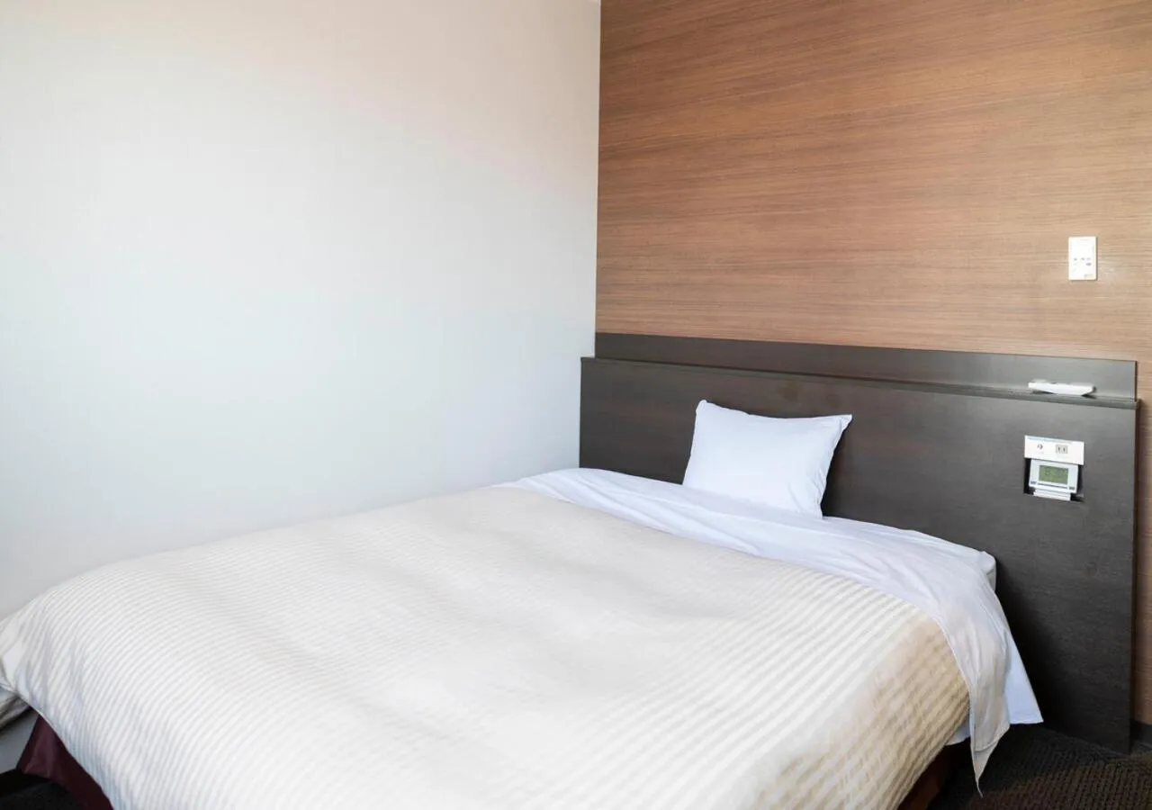 Bed in Hotel New Palace