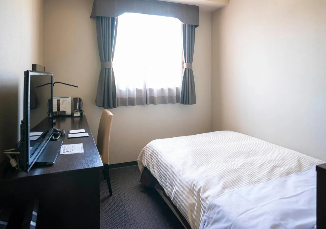 Bed in Hotel New Palace