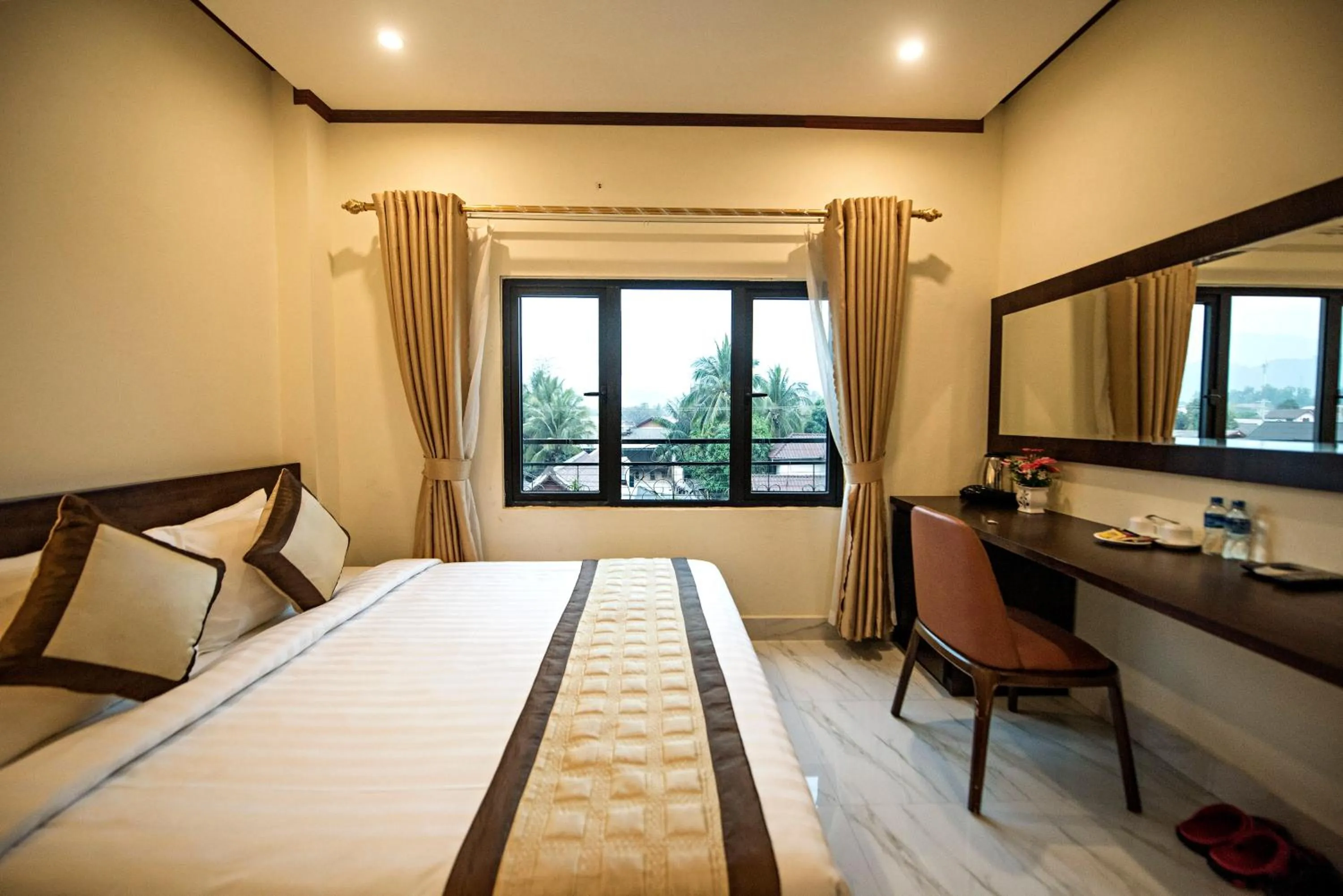 Bed in Premier Vang Vieng Hotel