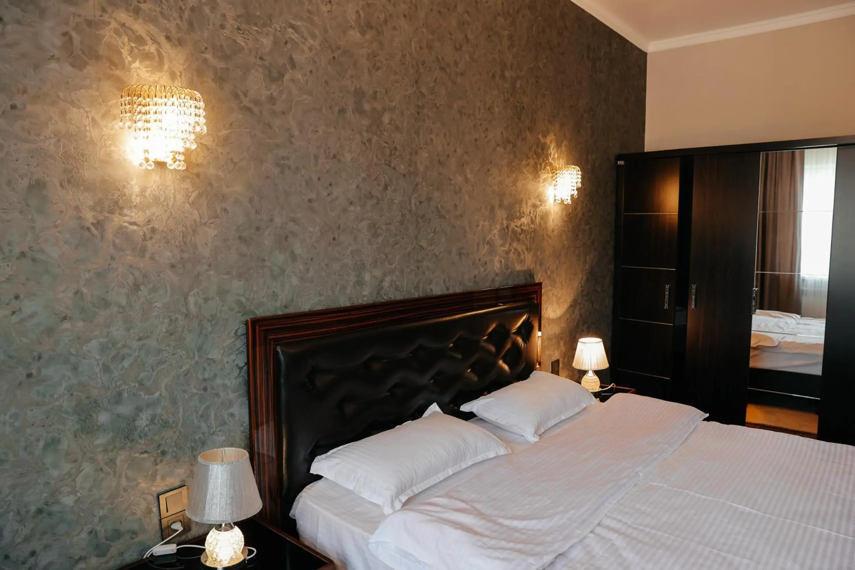 Photo of the whole room, Bed in Grand Hotel Photo of the whole room, Bed in Grand Hotel