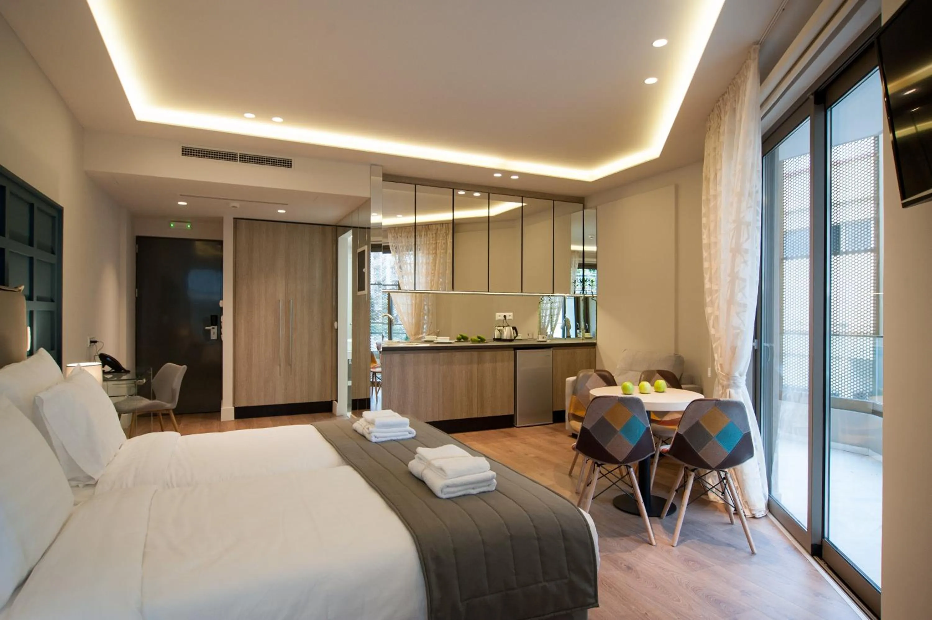 Bed in Athens Platinum Rooms and Suites