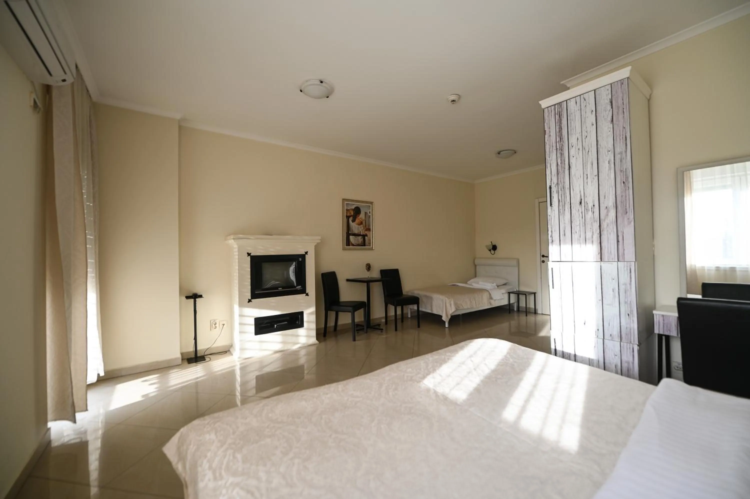 Bed in Garni Hotel Dash