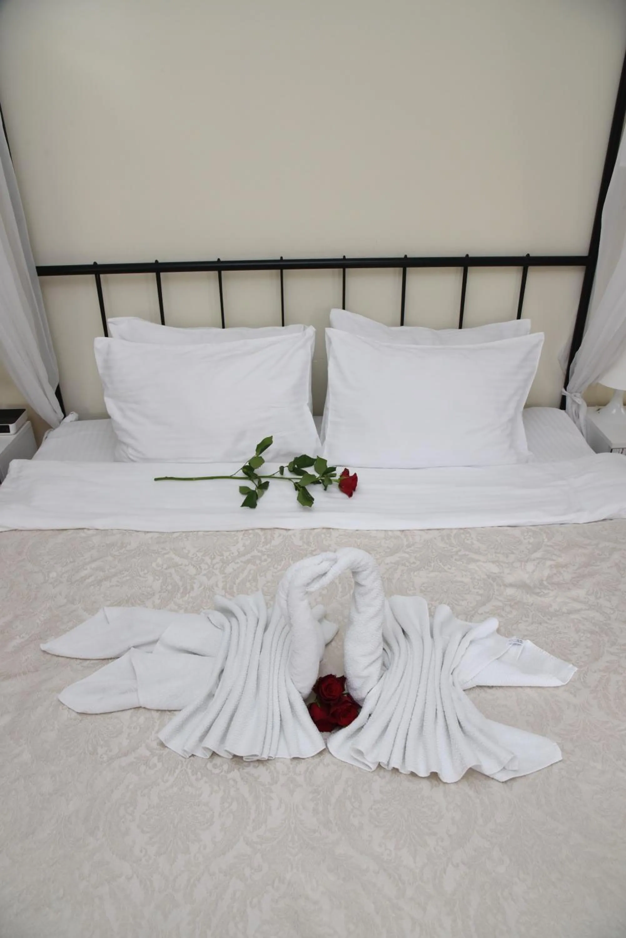 Bed in Garni Hotel Dash