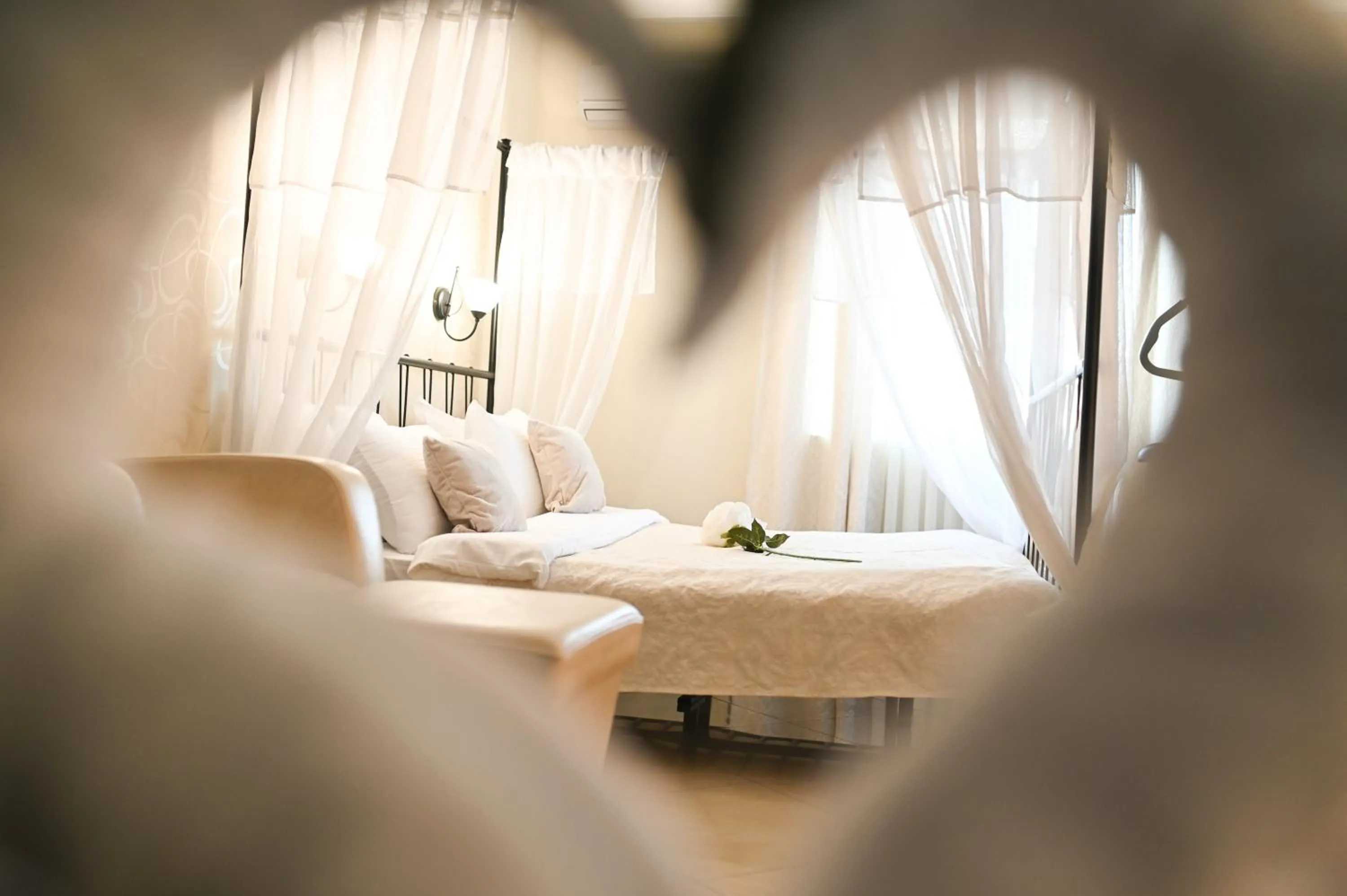 Bed in Garni Hotel Dash