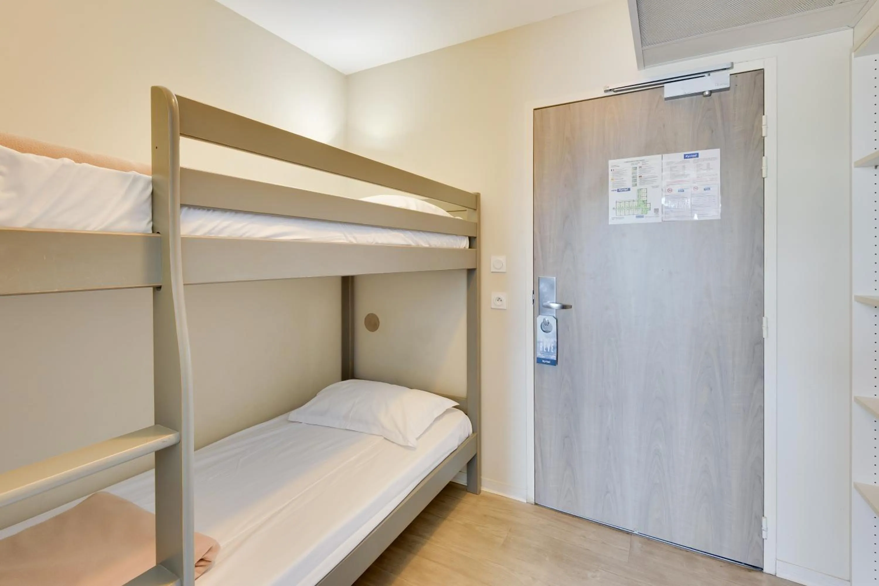 Bed in Kyriad Perpignan Sud