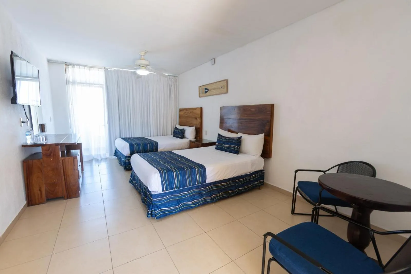 TV and multimedia, Bed in Costa Alegre Hotel & Suites