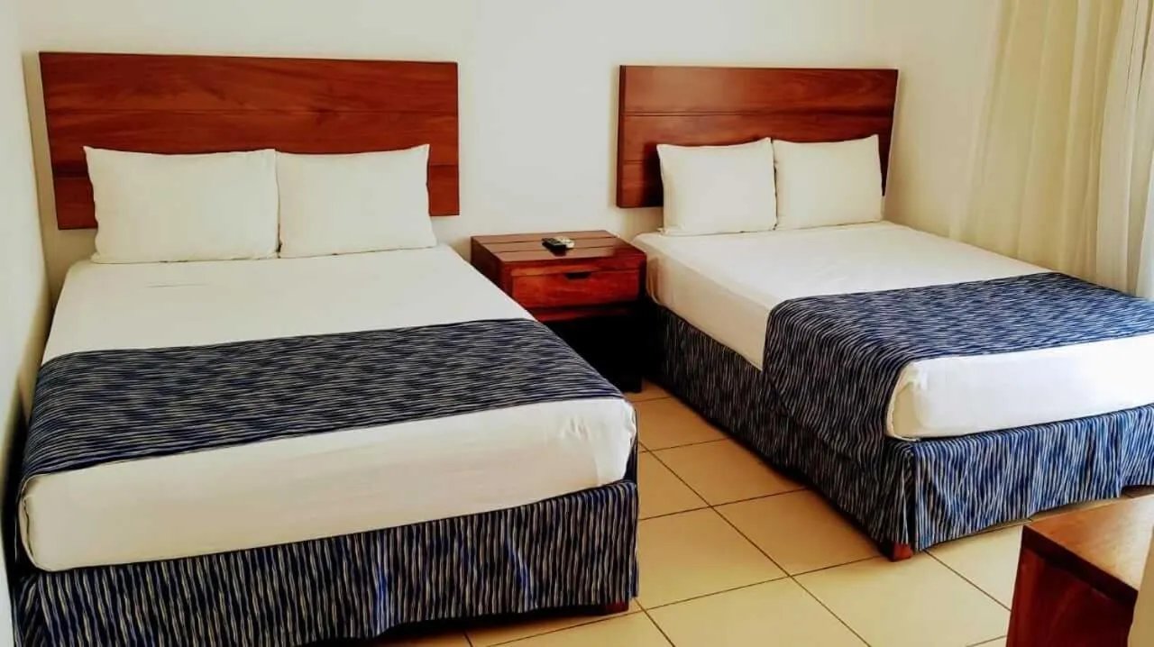Bed in Costa Alegre Hotel & Suites