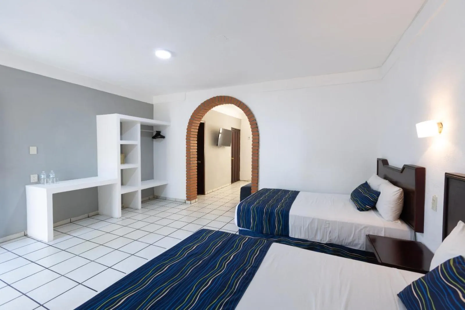 Bed in Costa Alegre Hotel & Suites