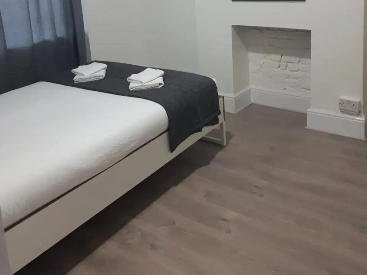 Bedroom, Bed in Marble Apartments Broadway Two Bedroom, Bed in Marble Apartments Broadway Two