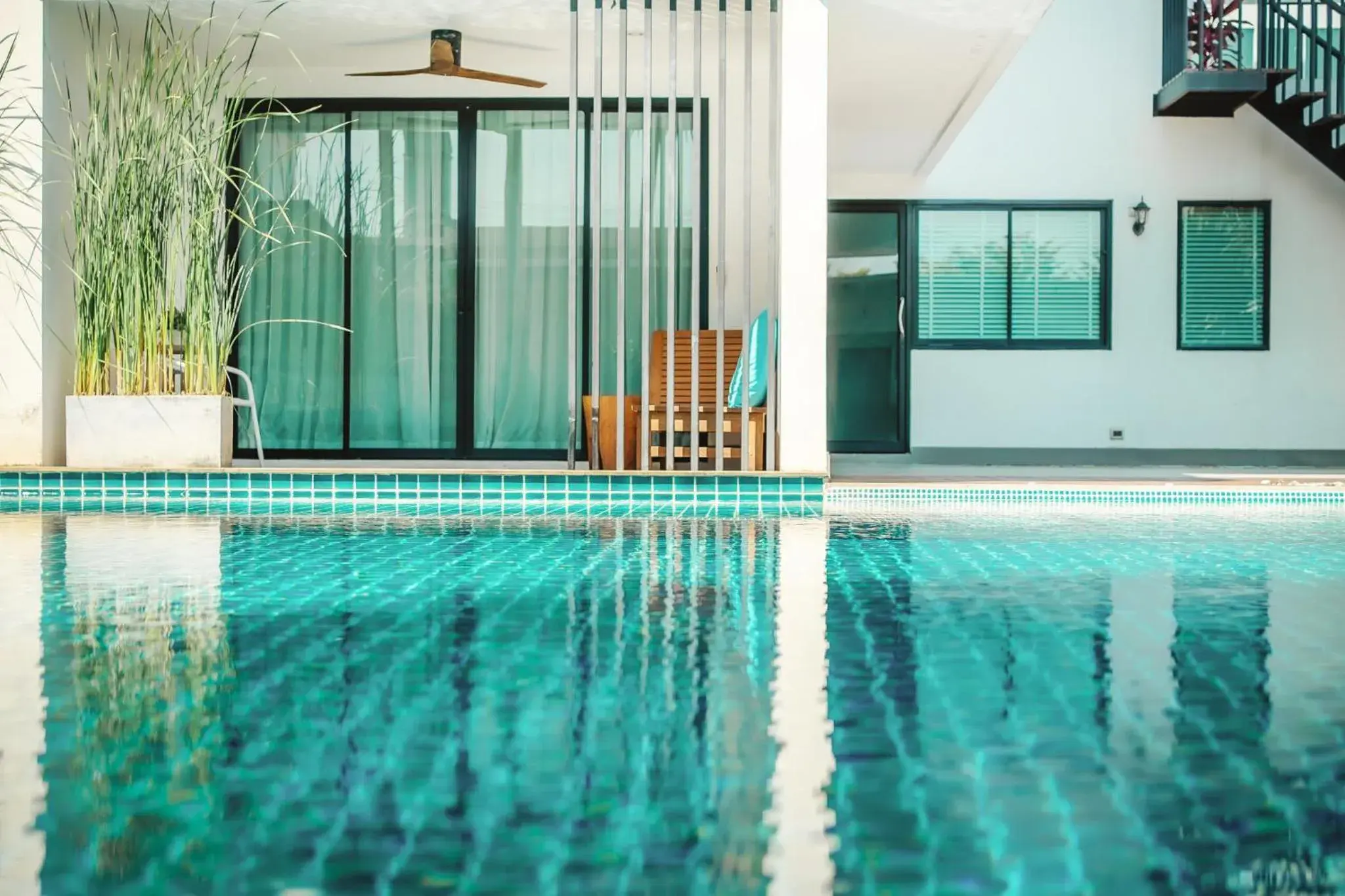 Swimming pool in The Pago Design Hotel Phuket-SHA Plus Swimming pool in The Pago Design Hotel Phuket-SHA Plus